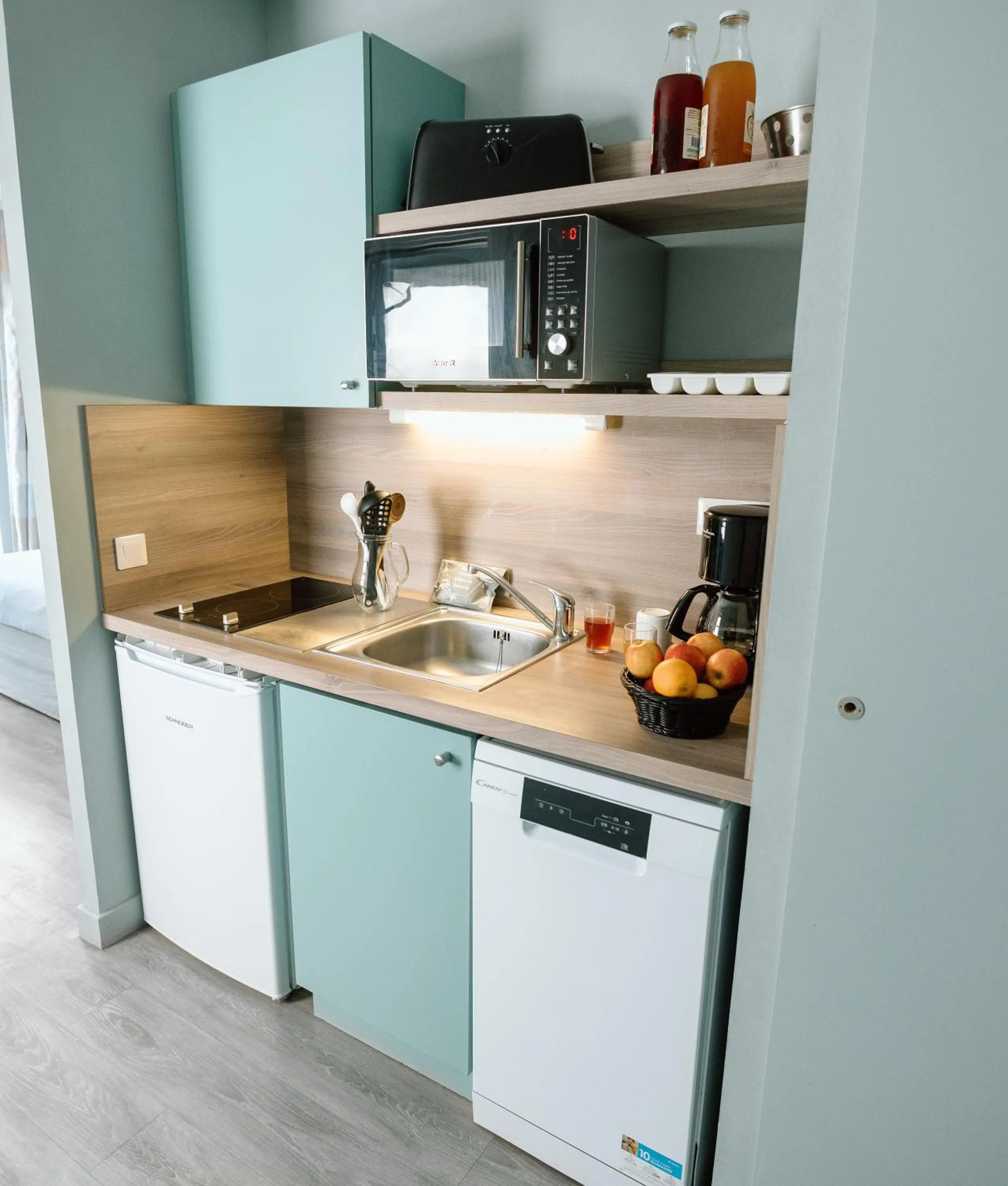 Kitchen or kitchenette in Résidence b'o cottage - b'o resort thermal & spa