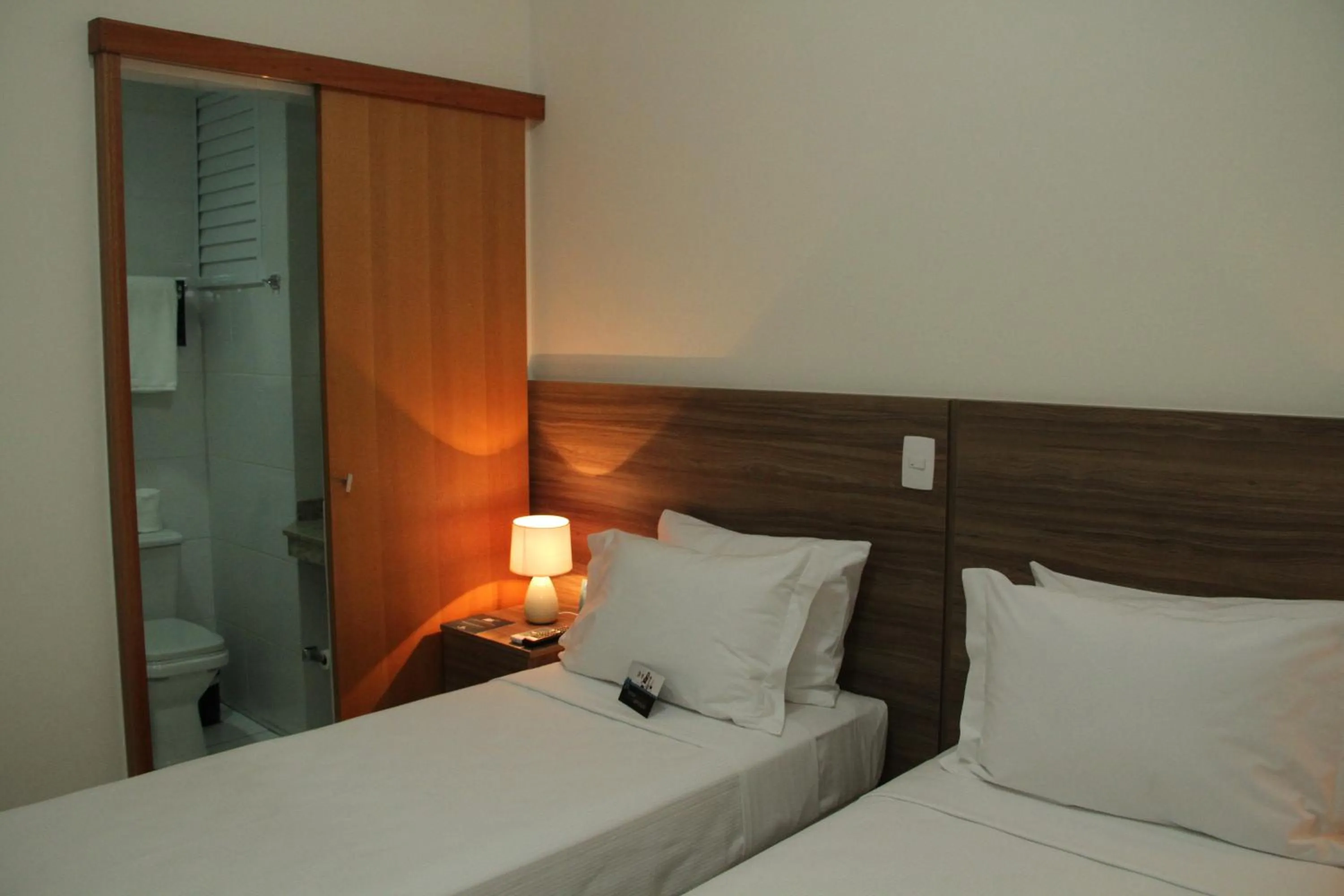 Photo of the whole room, Bed in The Hill Hotéis Executive