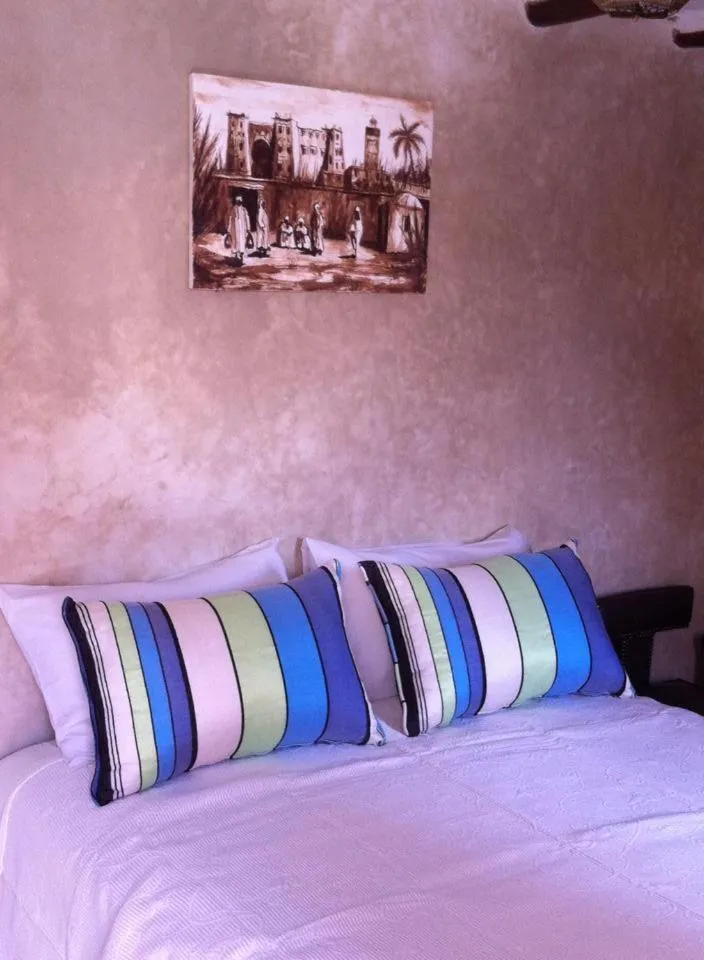 Bed in Riad Le Bel Oranger