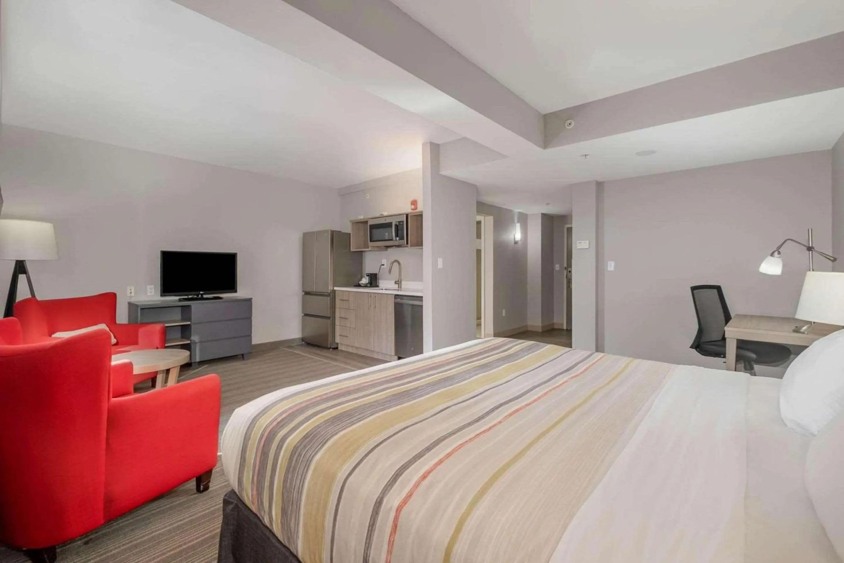 Bedroom, Bed in Country Inn & Suites by Radisson, Port Canaveral, FL