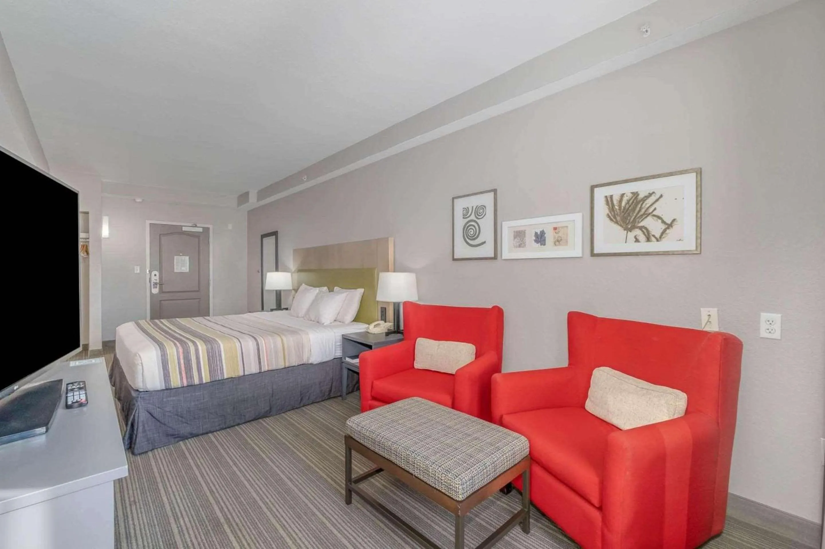 Bedroom, Bed in Country Inn & Suites by Radisson, Port Canaveral, FL