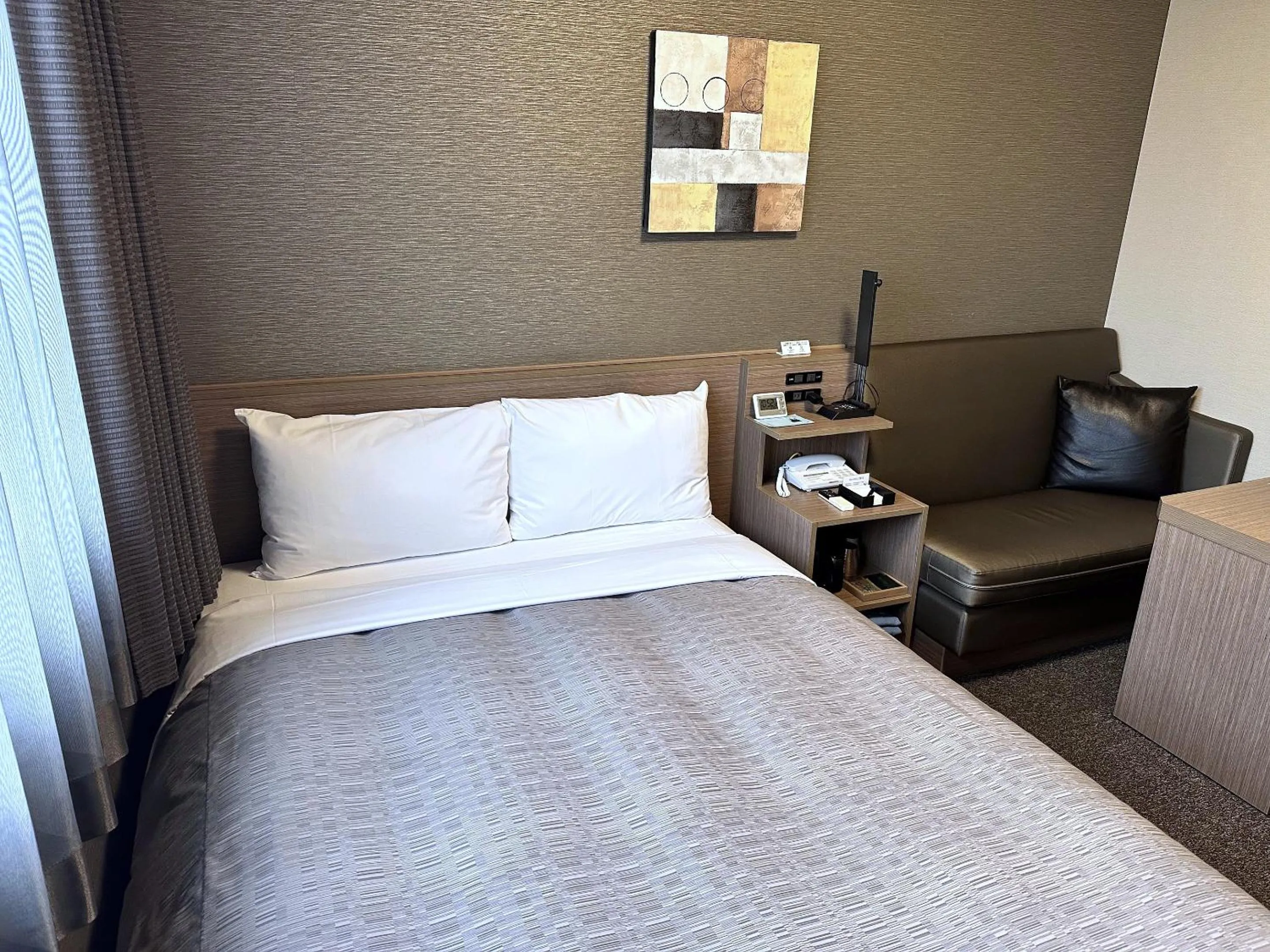 Bed in Hotel Route-Inn Katori Sawara Ekimae