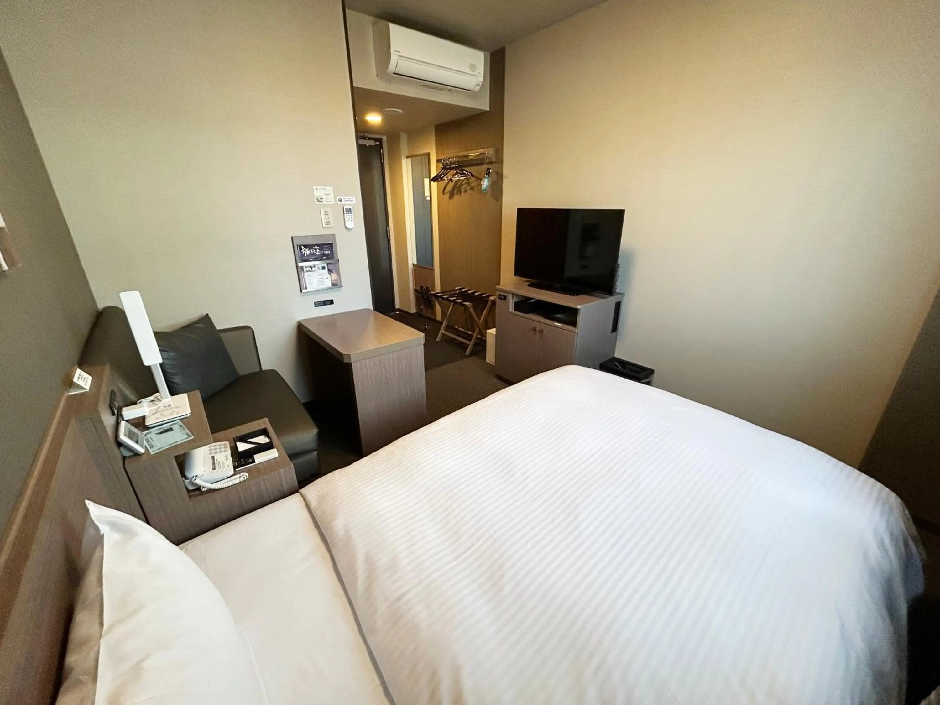 Photo of the whole room, Bed in Hotel Route-Inn Katori Sawara Ekimae