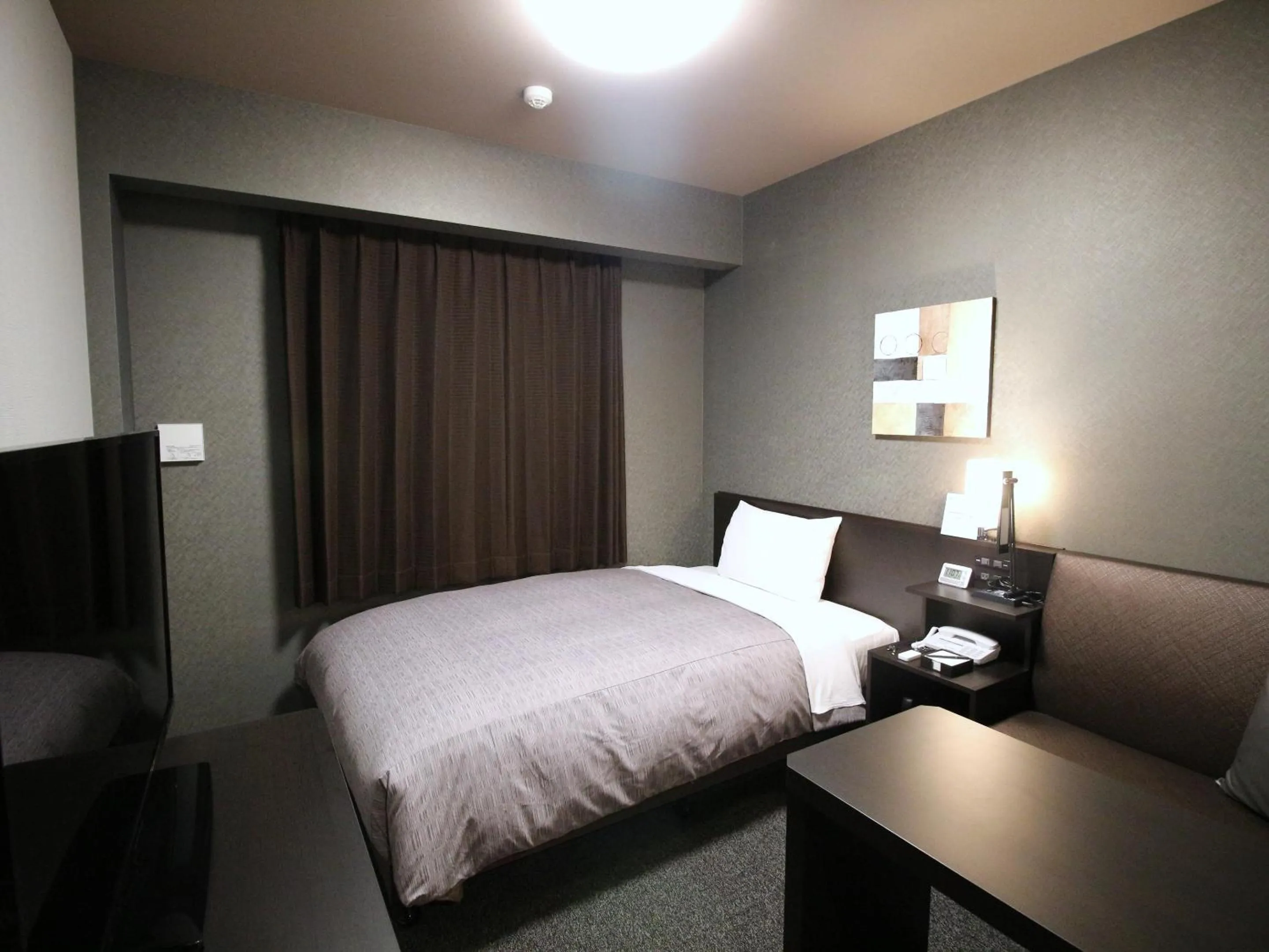 Photo of the whole room, Bed in Hotel Route-Inn Katori Sawara Ekimae