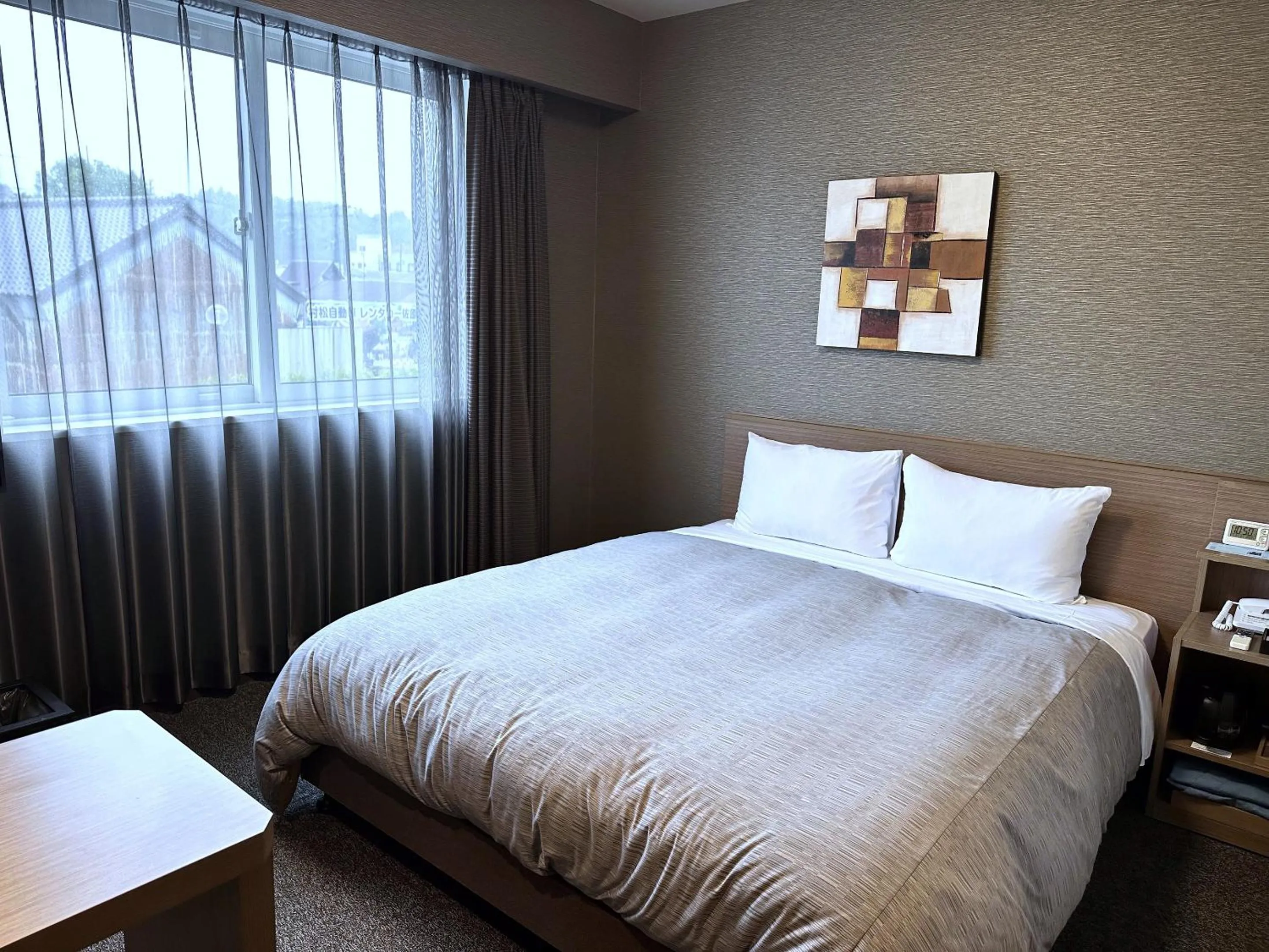 Bed in Hotel Route-Inn Katori Sawara Ekimae