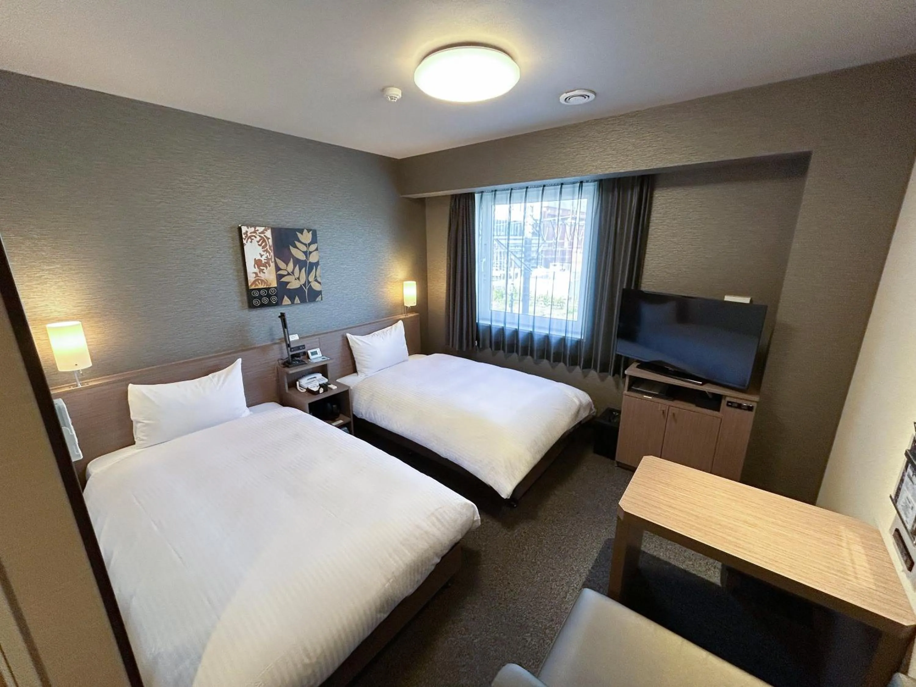 Photo of the whole room, Bed in Hotel Route-Inn Katori Sawara Ekimae