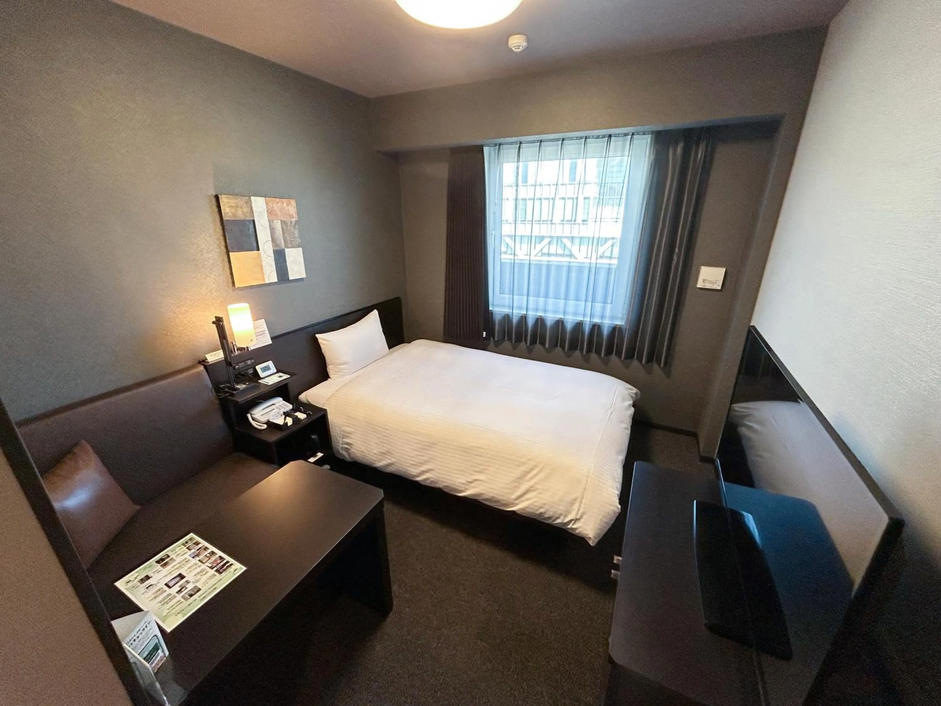 Photo of the whole room, Bed in Hotel Route-Inn Katori Sawara Ekimae
