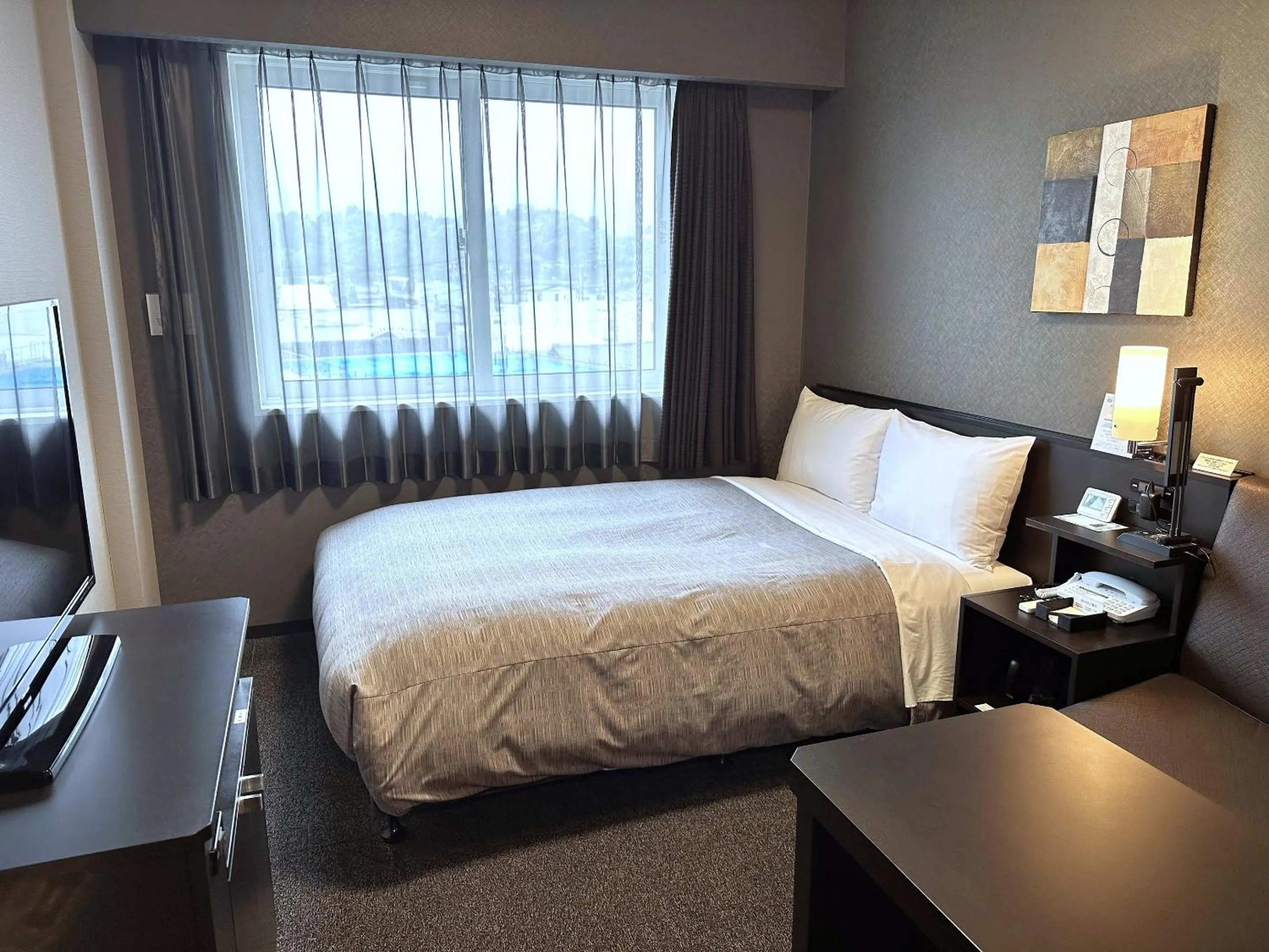 Photo of the whole room, Bed in Hotel Route-Inn Katori Sawara Ekimae