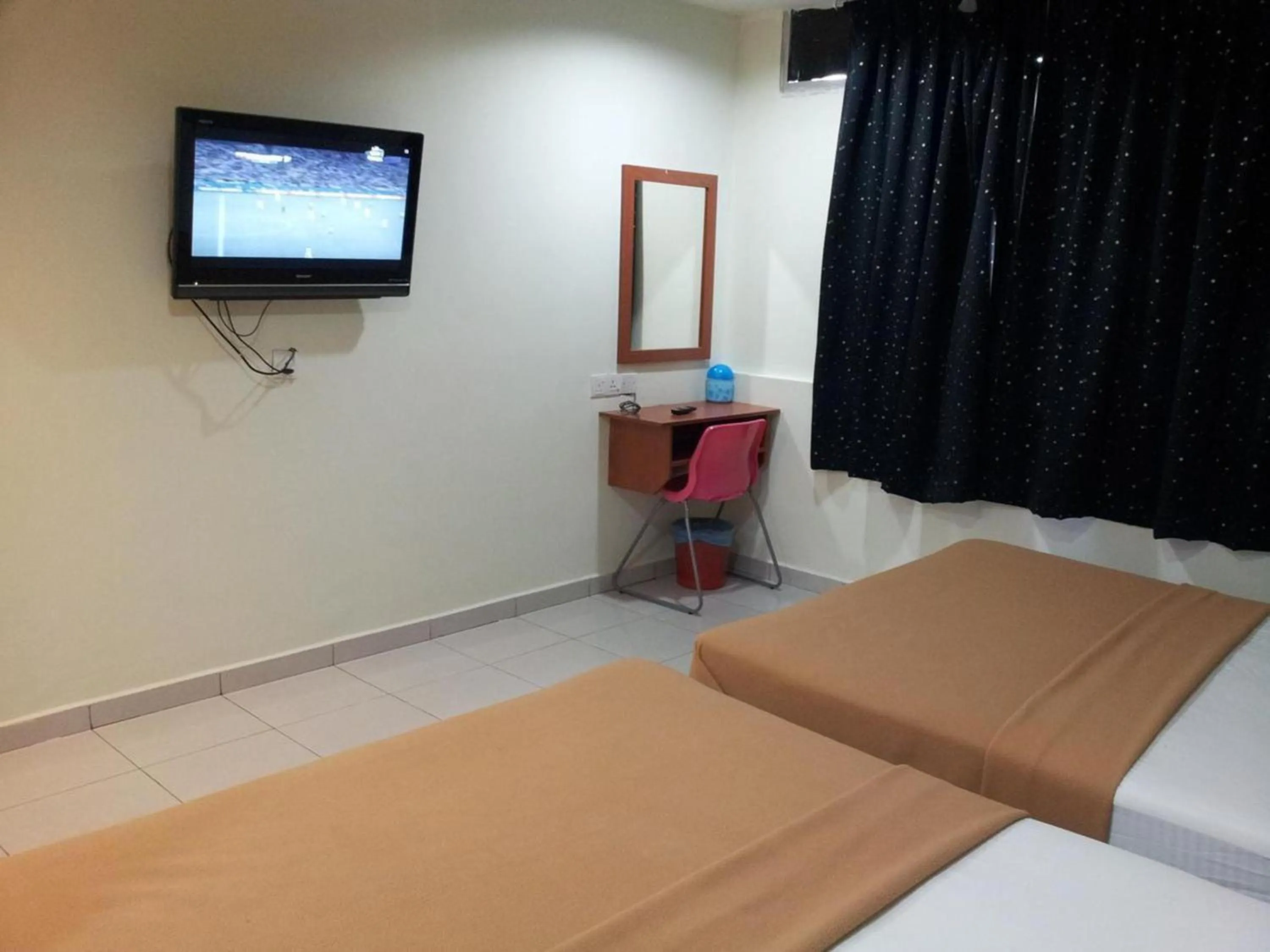 Bedroom in OYO 1055 Batu Caves Star Hotel