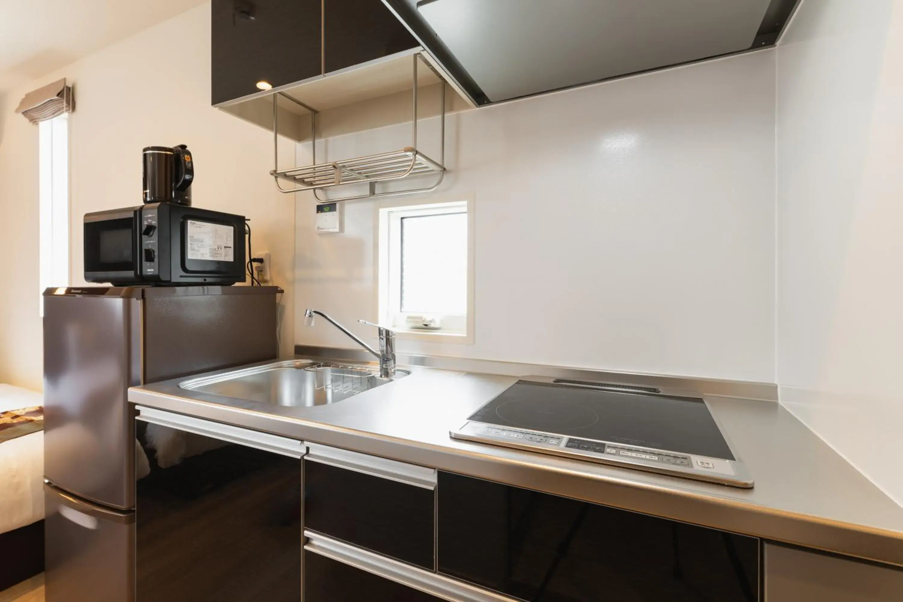 Kitchen or kitchenette in Ambicia Sasebo Kitchen or kitchenette in Ambicia Sasebo