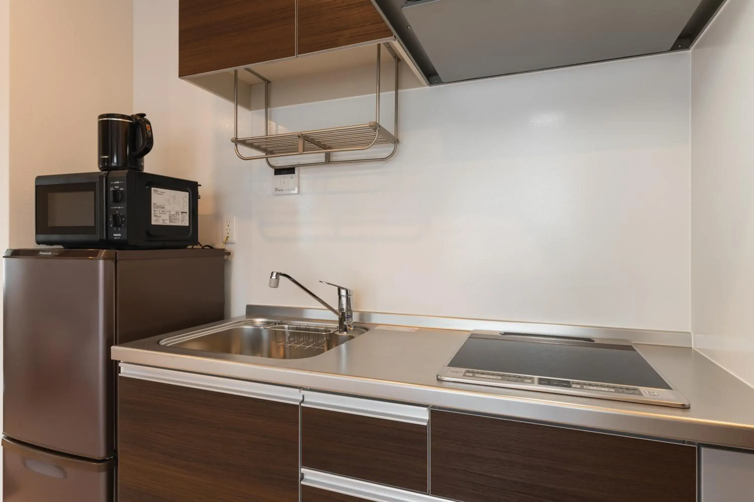 Kitchen or kitchenette in Ambicia Sasebo Kitchen or kitchenette in Ambicia Sasebo