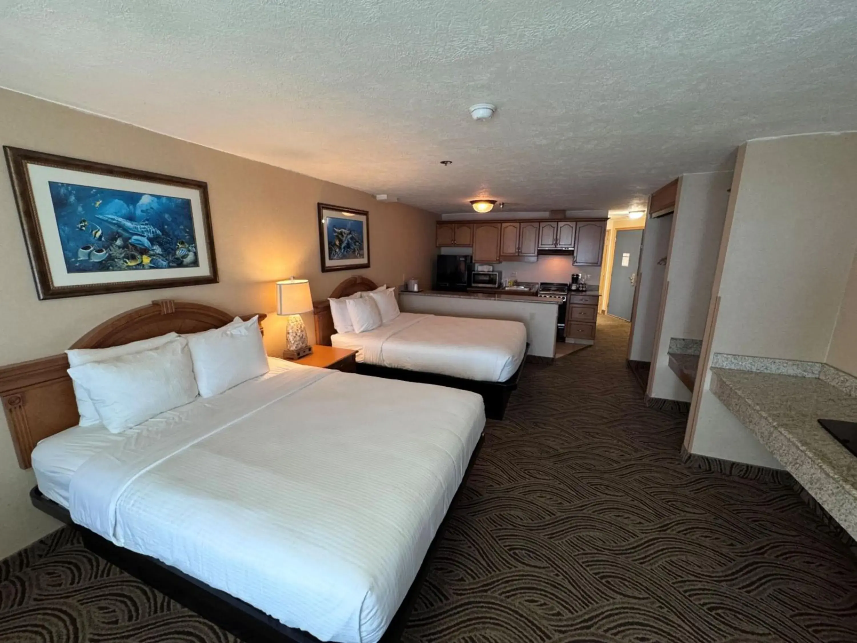 Bed in Promenade Inn & Suites Oceanfront Bed in Promenade Inn & Suites Oceanfront