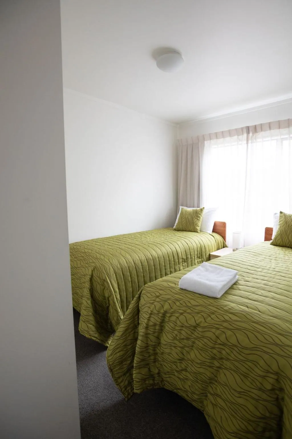 Bed in Peninsula Motel