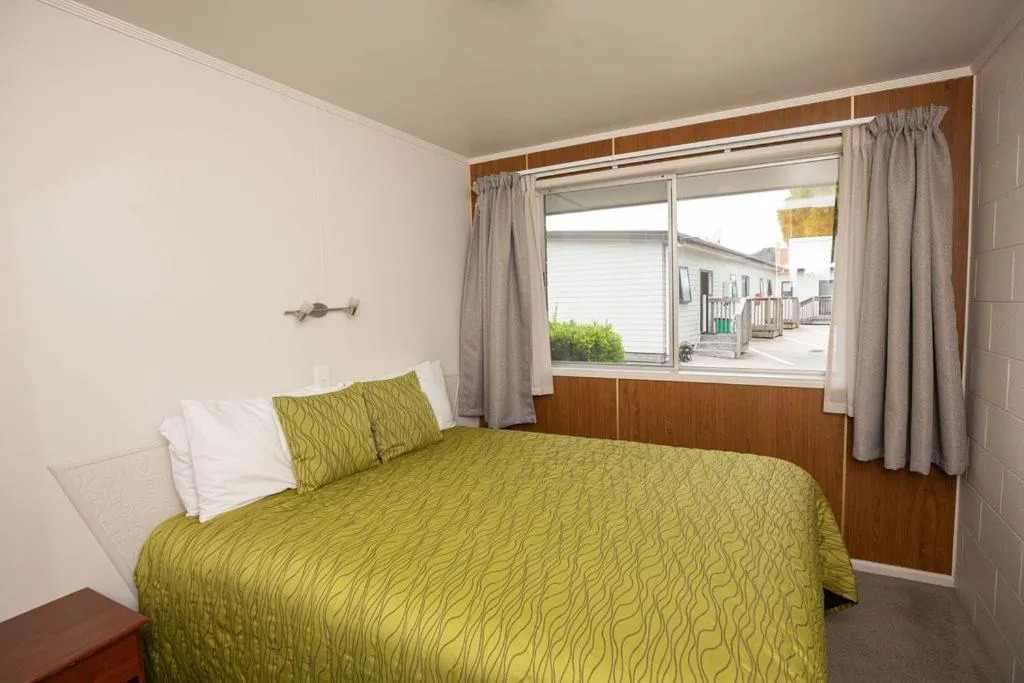 Bed in Peninsula Motel