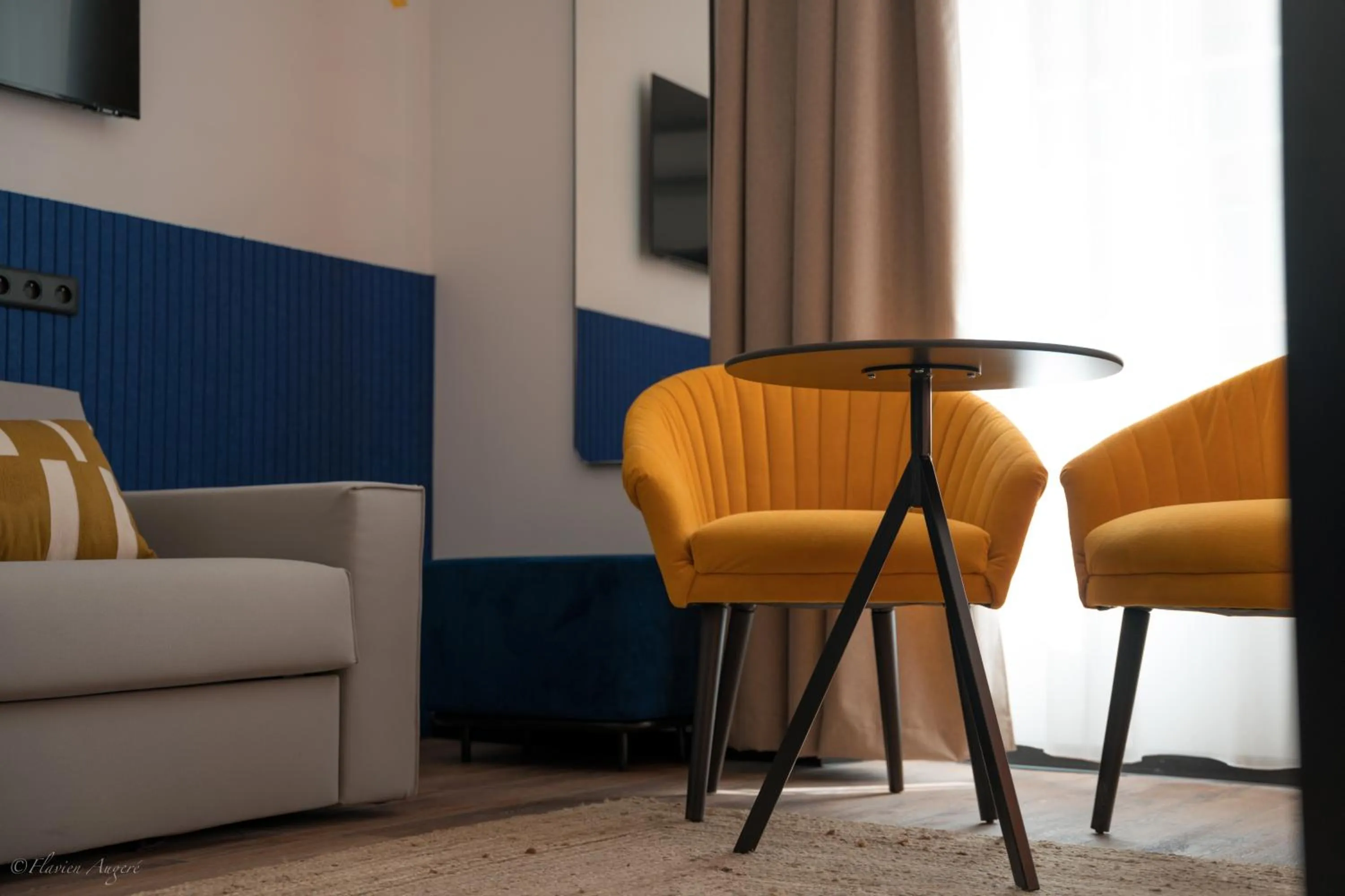 Seating area in ClapClap Hôtel, Food & Bar