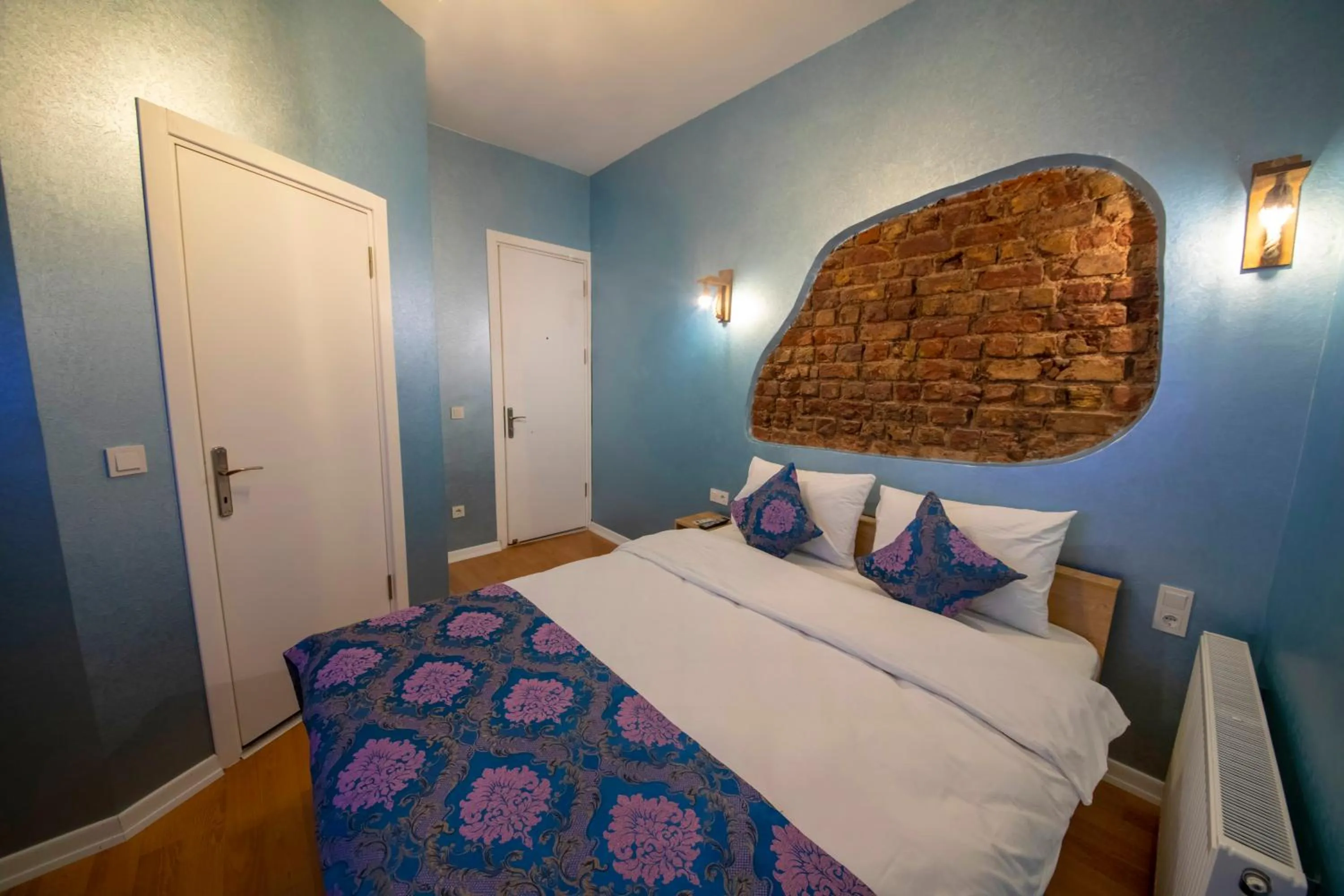 Bed in ROYAL TAKSIM SUITES