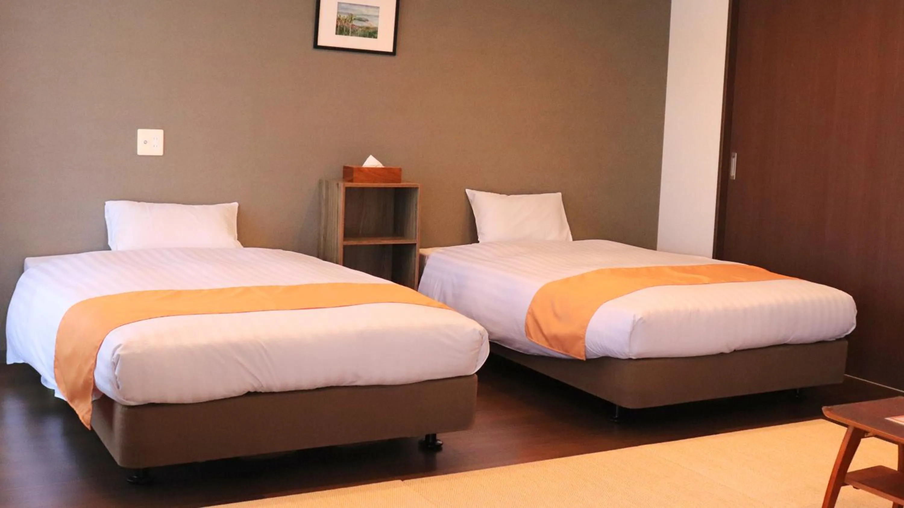 Bed in Apartment Hotel Ecott