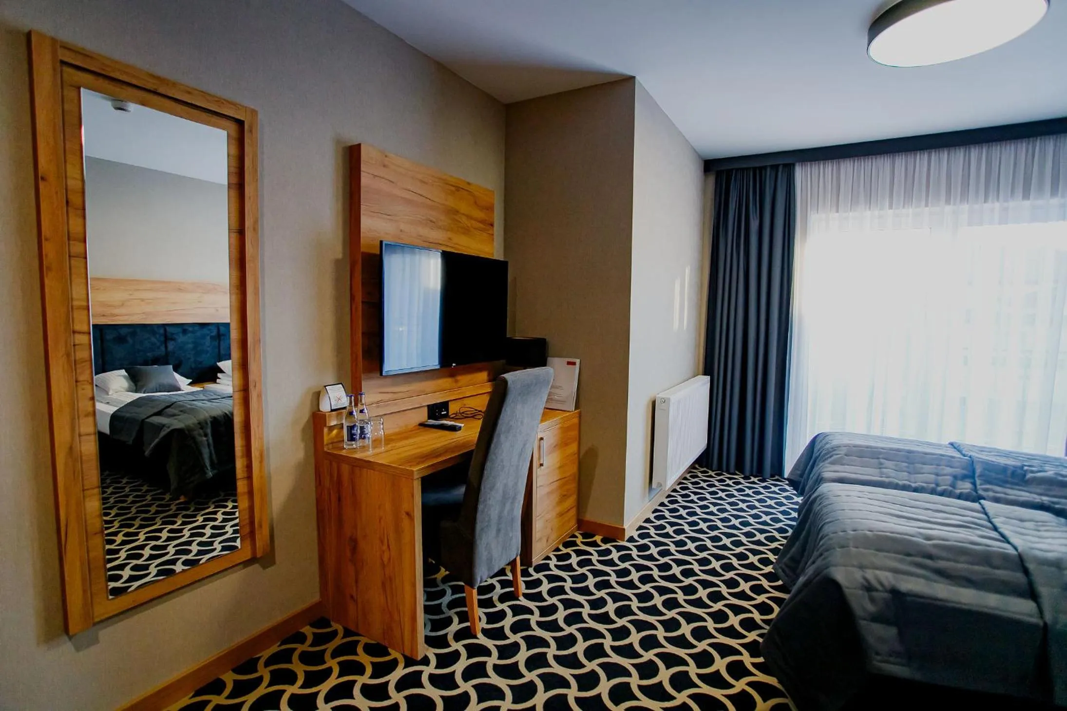 Bed in Hotel Coloseum