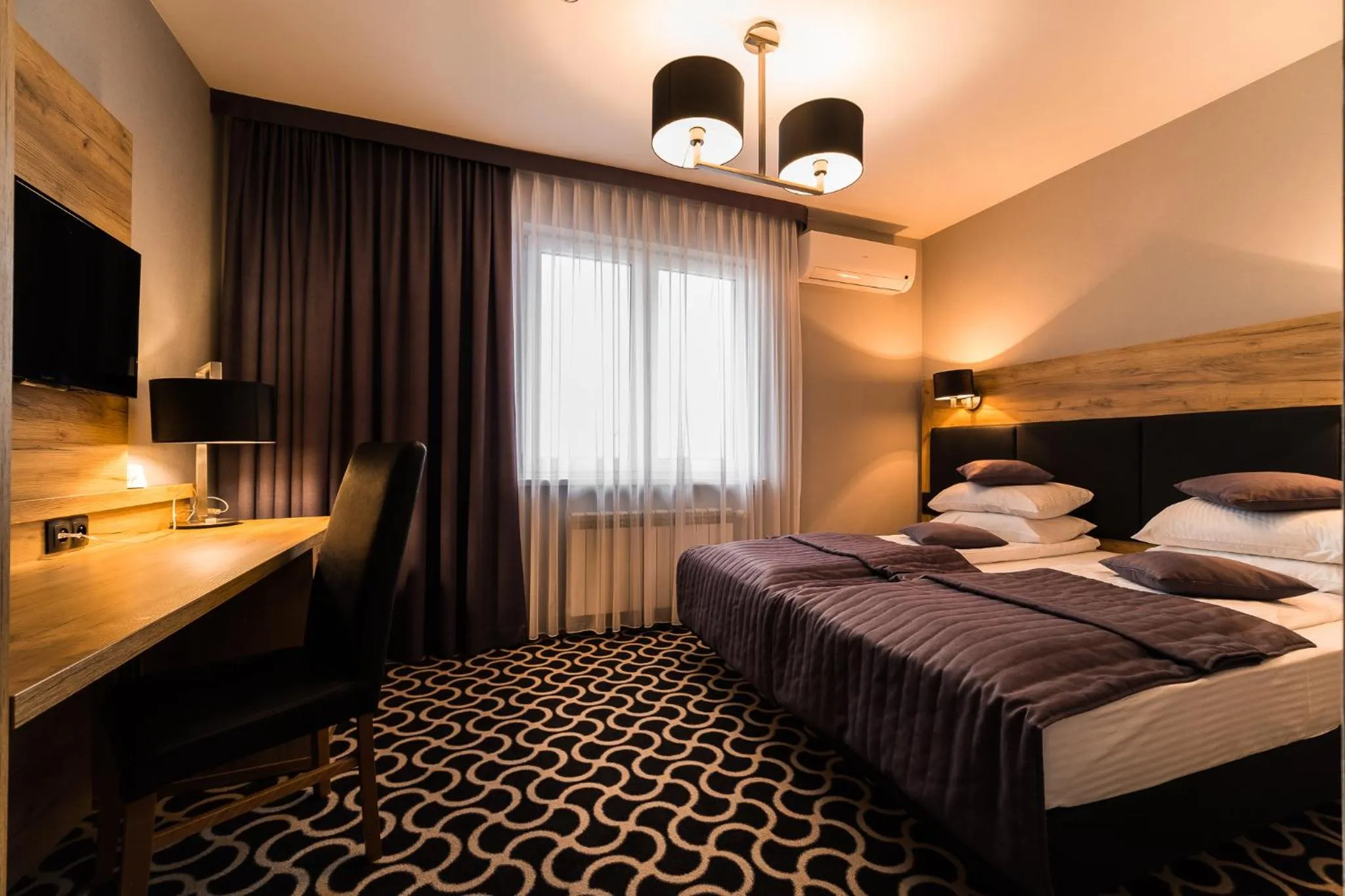 Bed in Hotel Coloseum