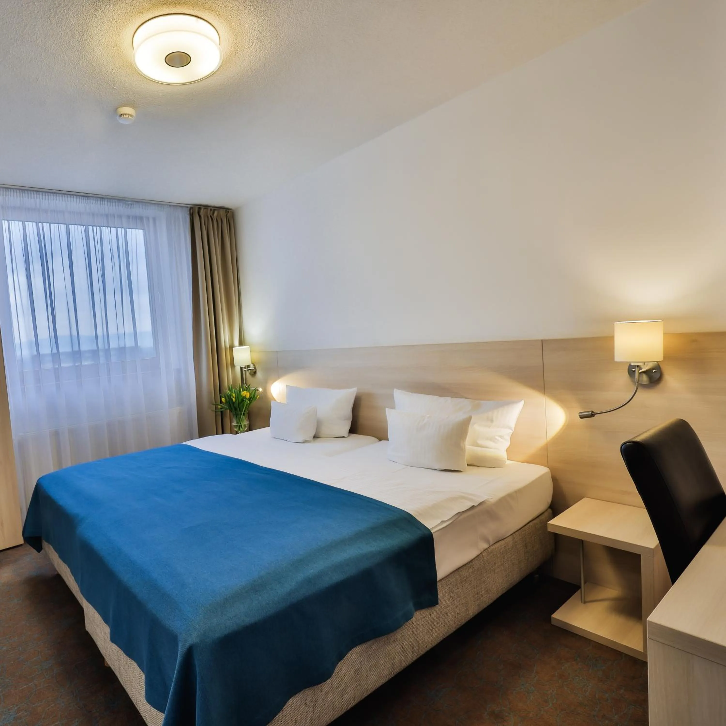 Photo of the whole room, Bed in Hotel Metropol WELLNESS & CONGRESS HOTEL