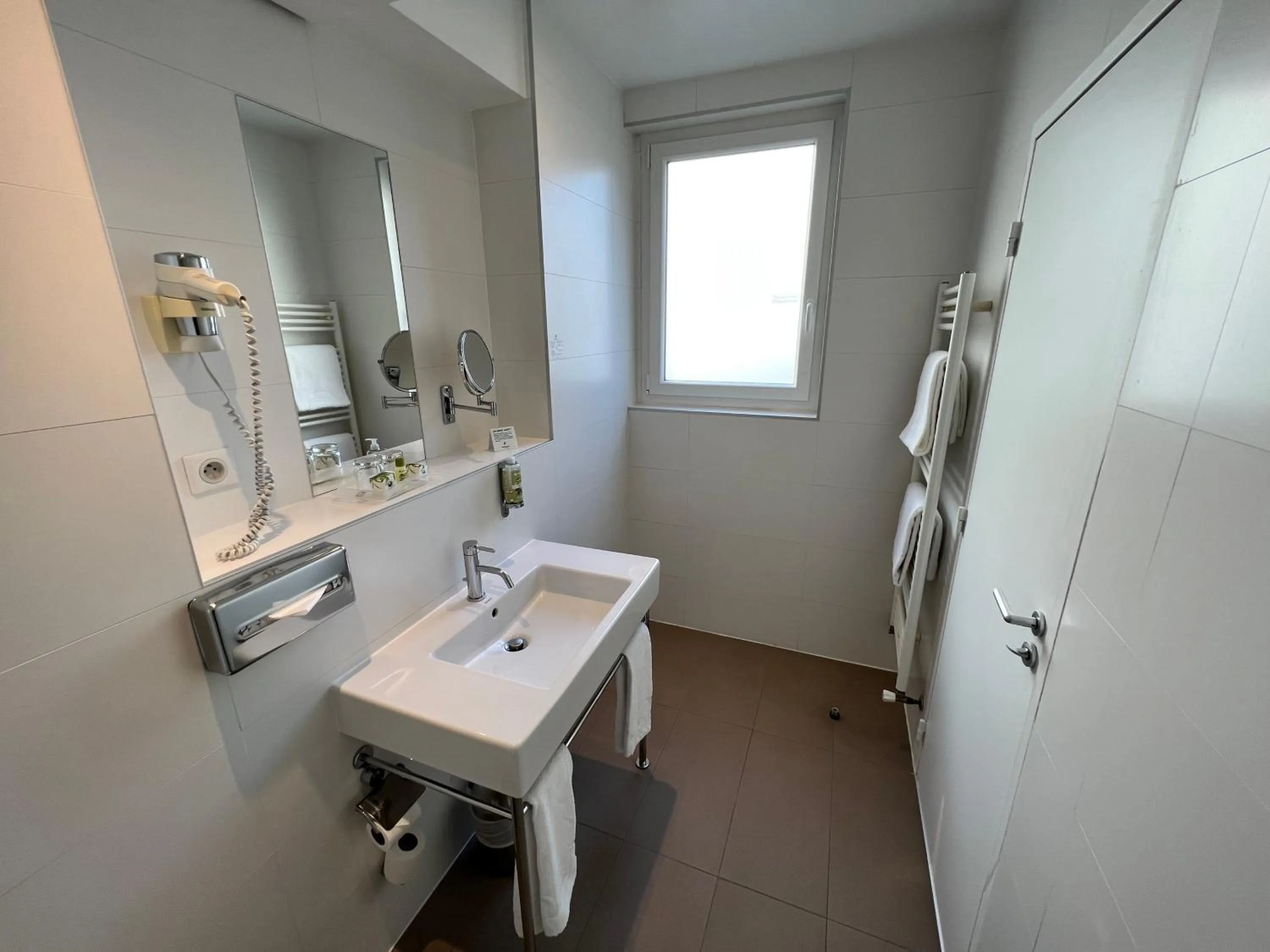 Bathroom in Holiday Inn Paris-Auteuil by IHG