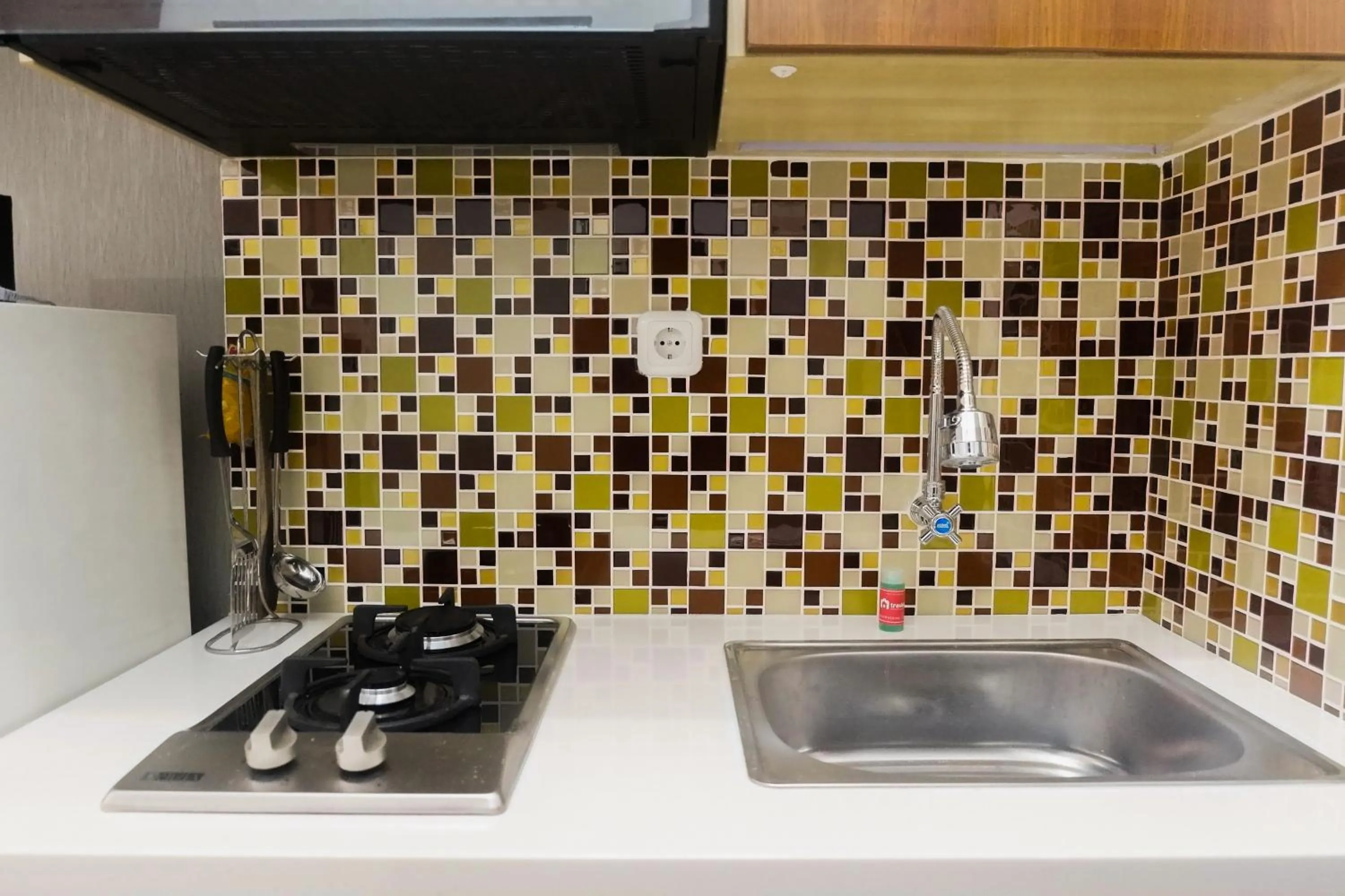 Comfy Studio Apartment at Menara Rungkut By Travelio