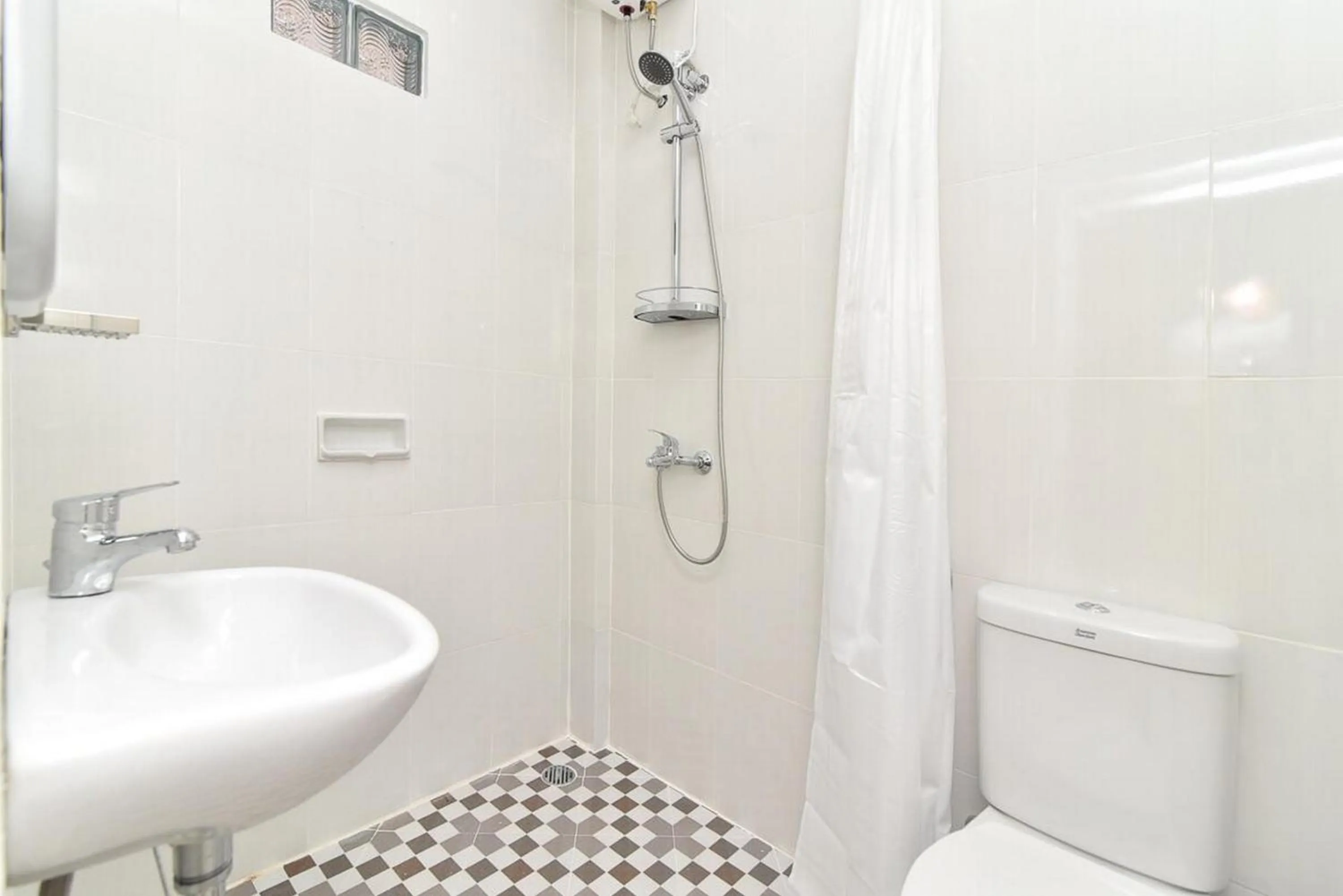 Bathroom in RedDoorz Plus near Jalan Imam Bonjol Denpasar