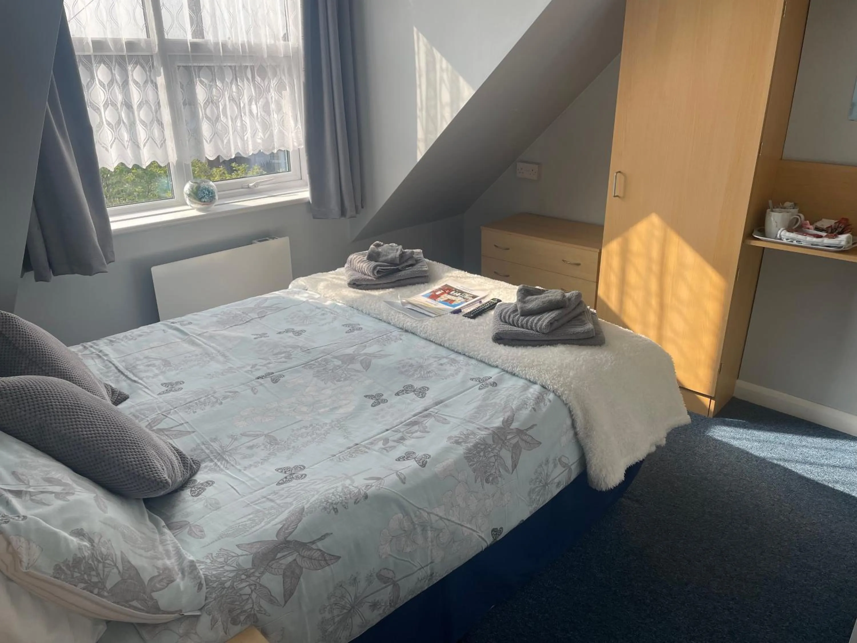 Bed in Ivydene Guest House