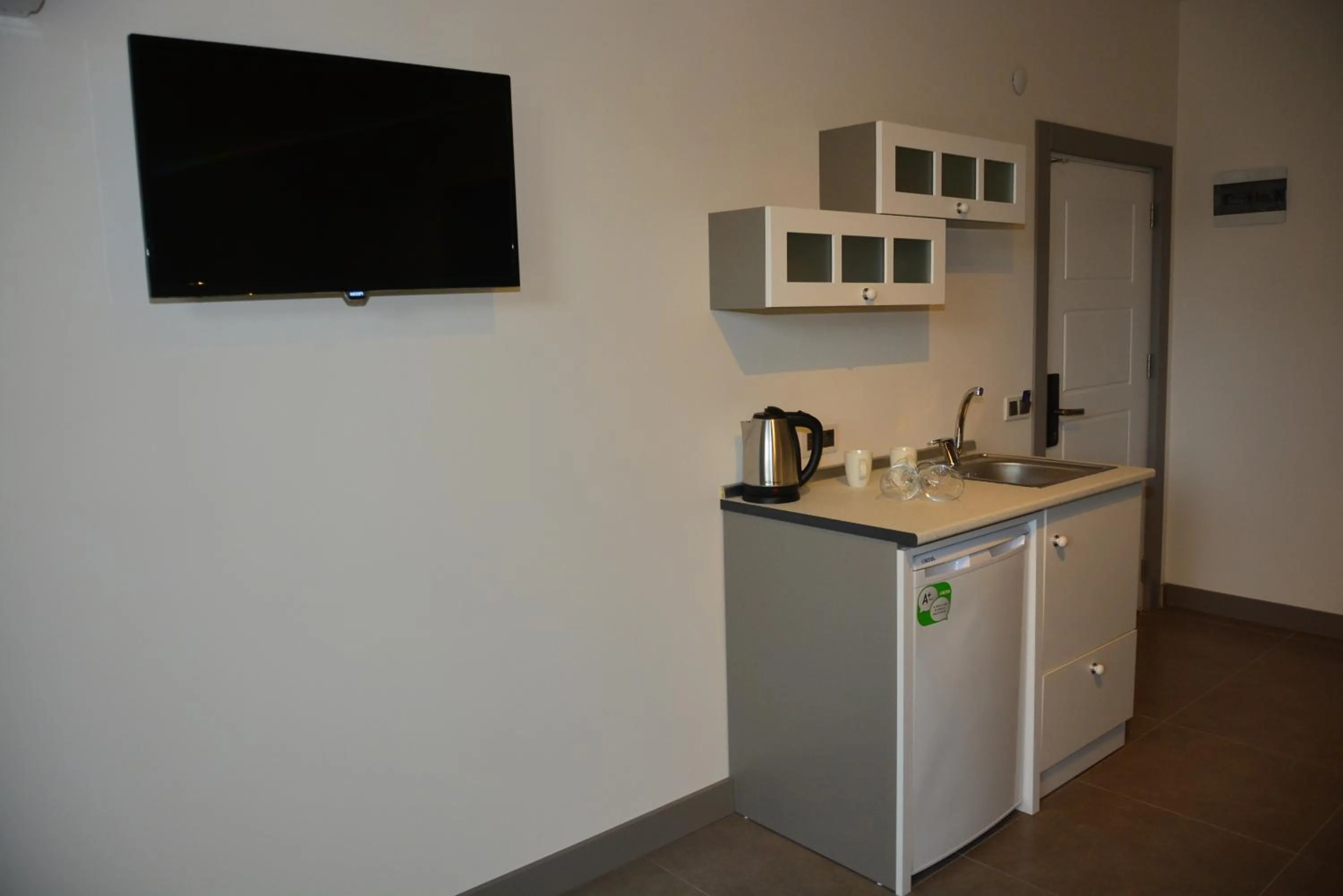 Kitchen or kitchenette in THE NORDİC HOTEL
