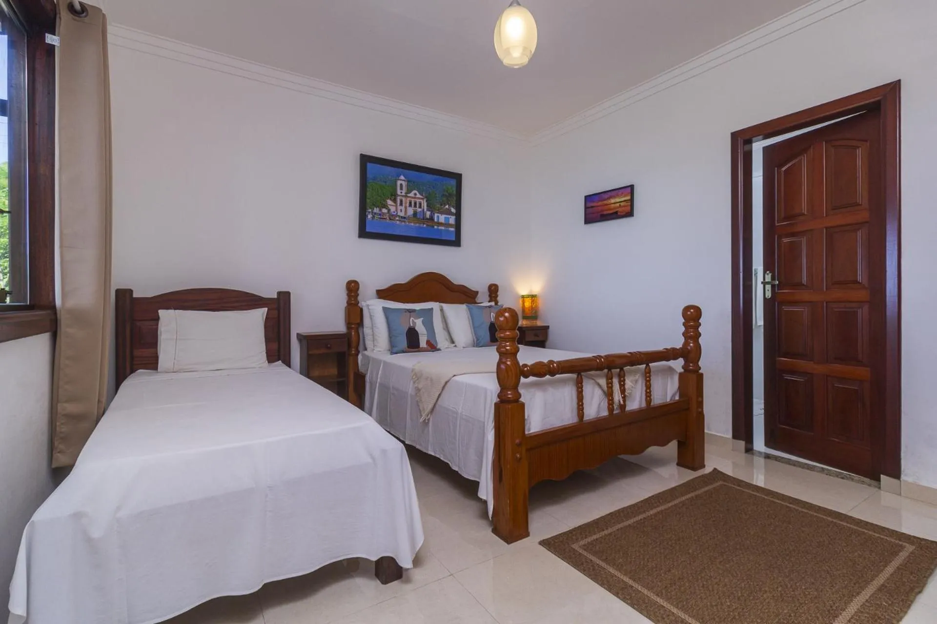 Photo of the whole room, Bed in Pousada Recanto de Paraty