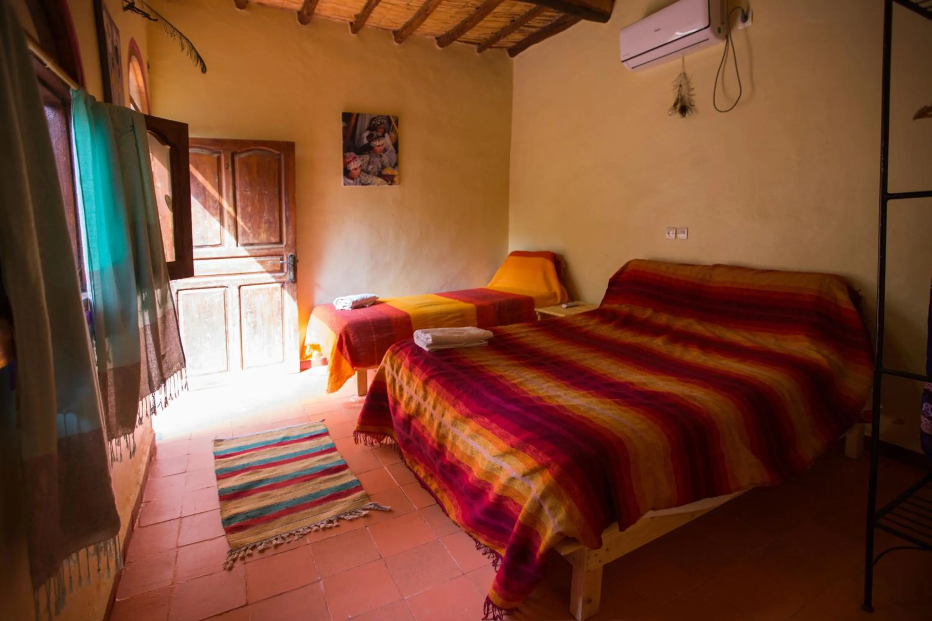 Bed in Ecolodge La Palmeraie