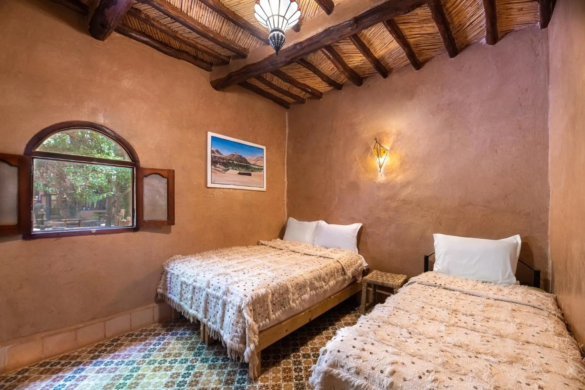 Bed in Ecolodge La Palmeraie