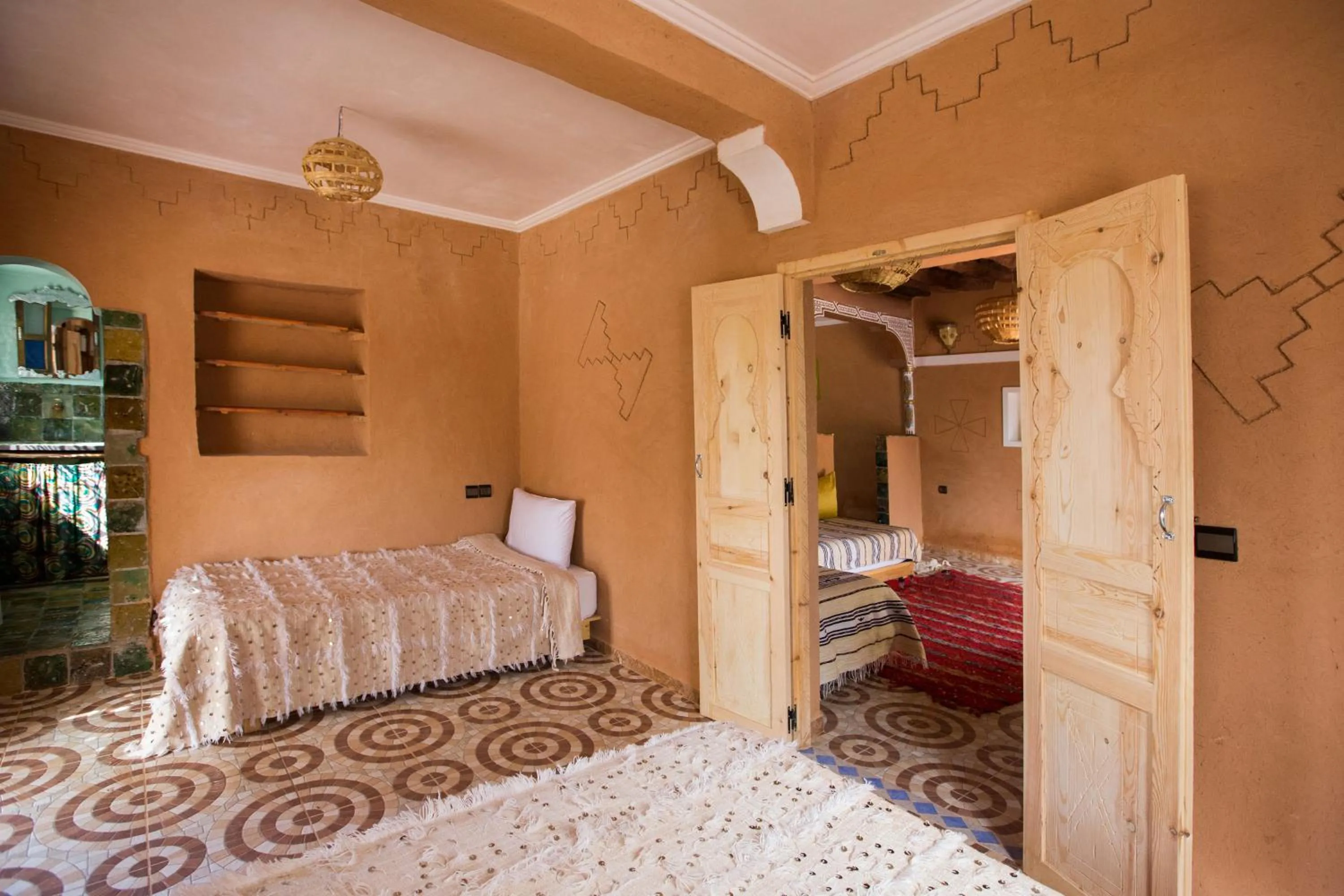 Bed in Ecolodge La Palmeraie