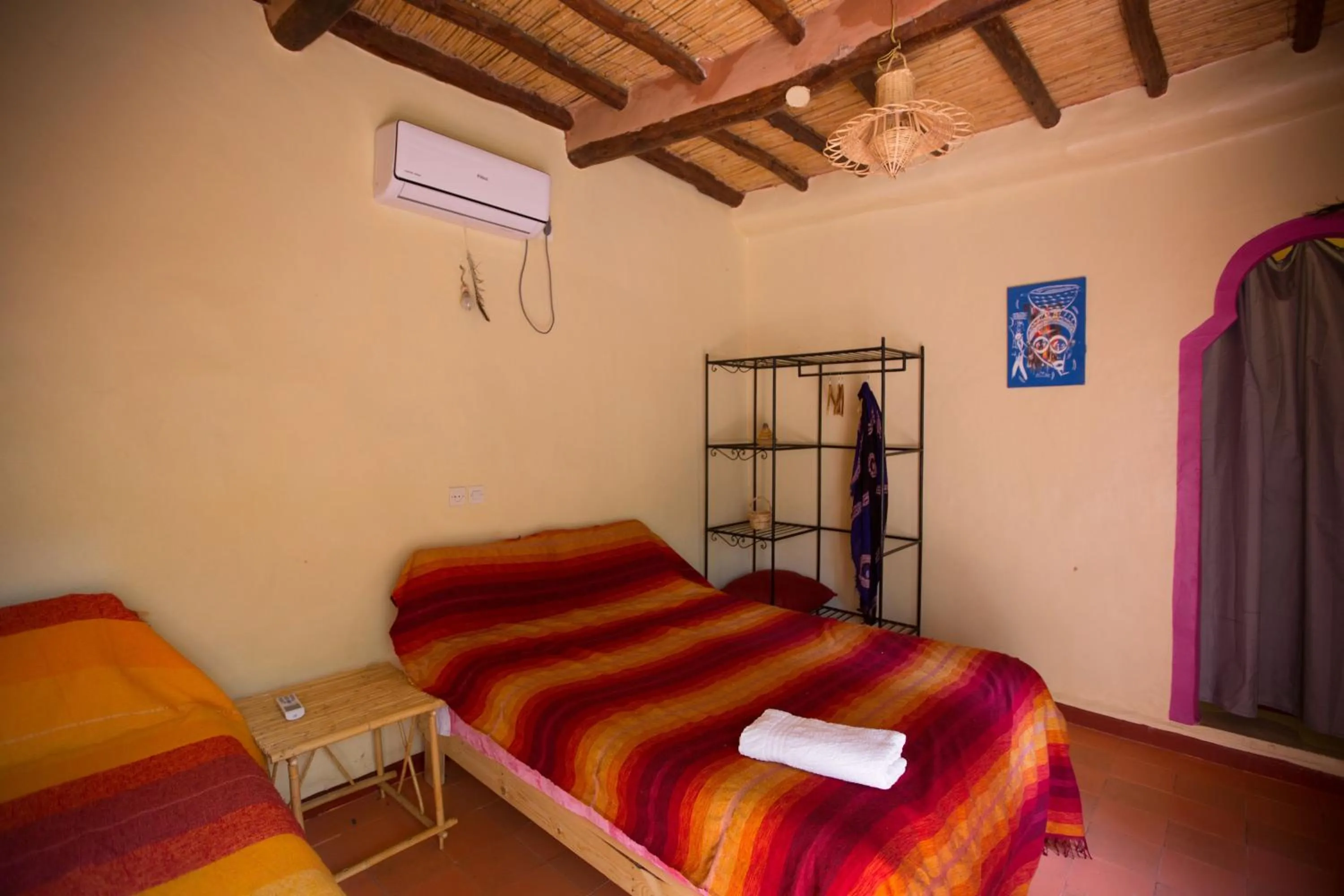 Bed in Ecolodge La Palmeraie