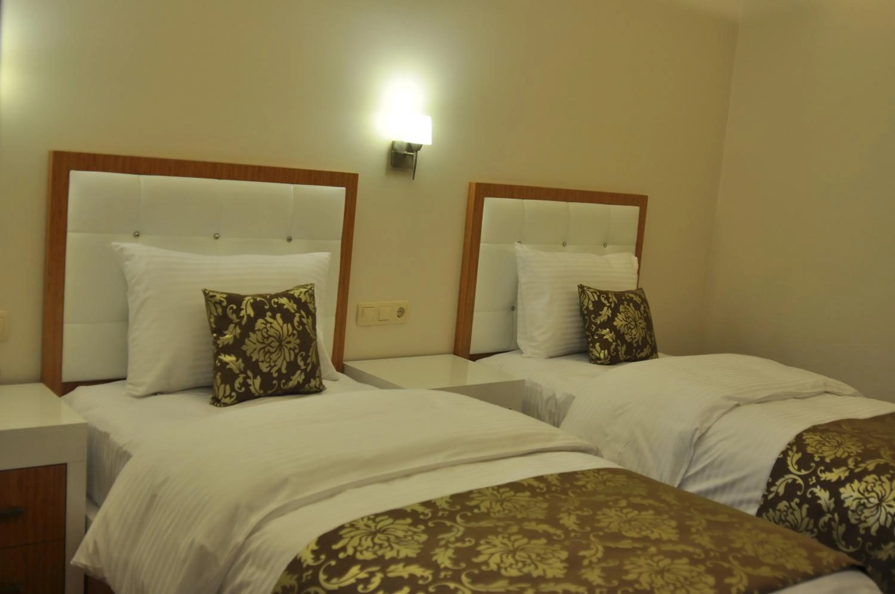 Bed in Cebeciler Hotel