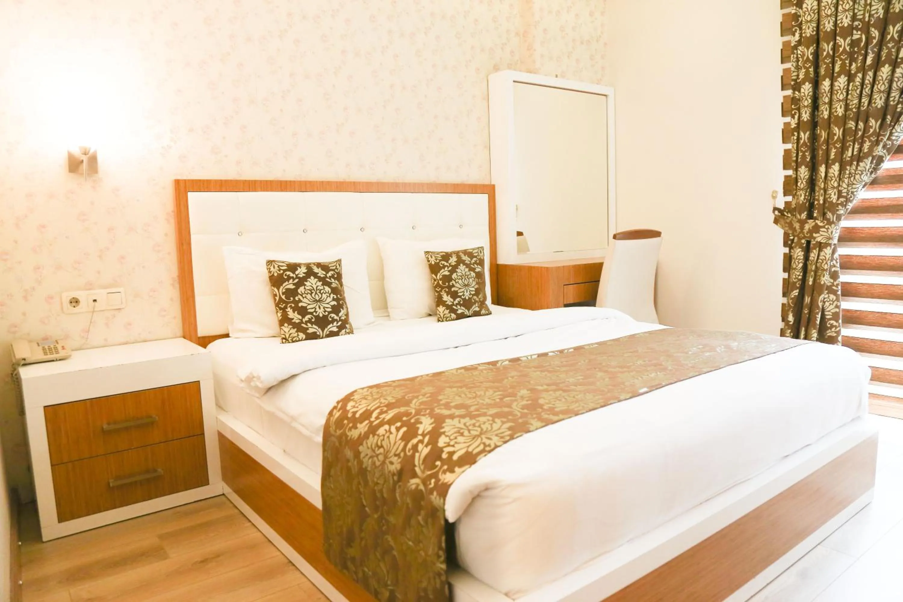 Bed in Cebeciler Hotel
