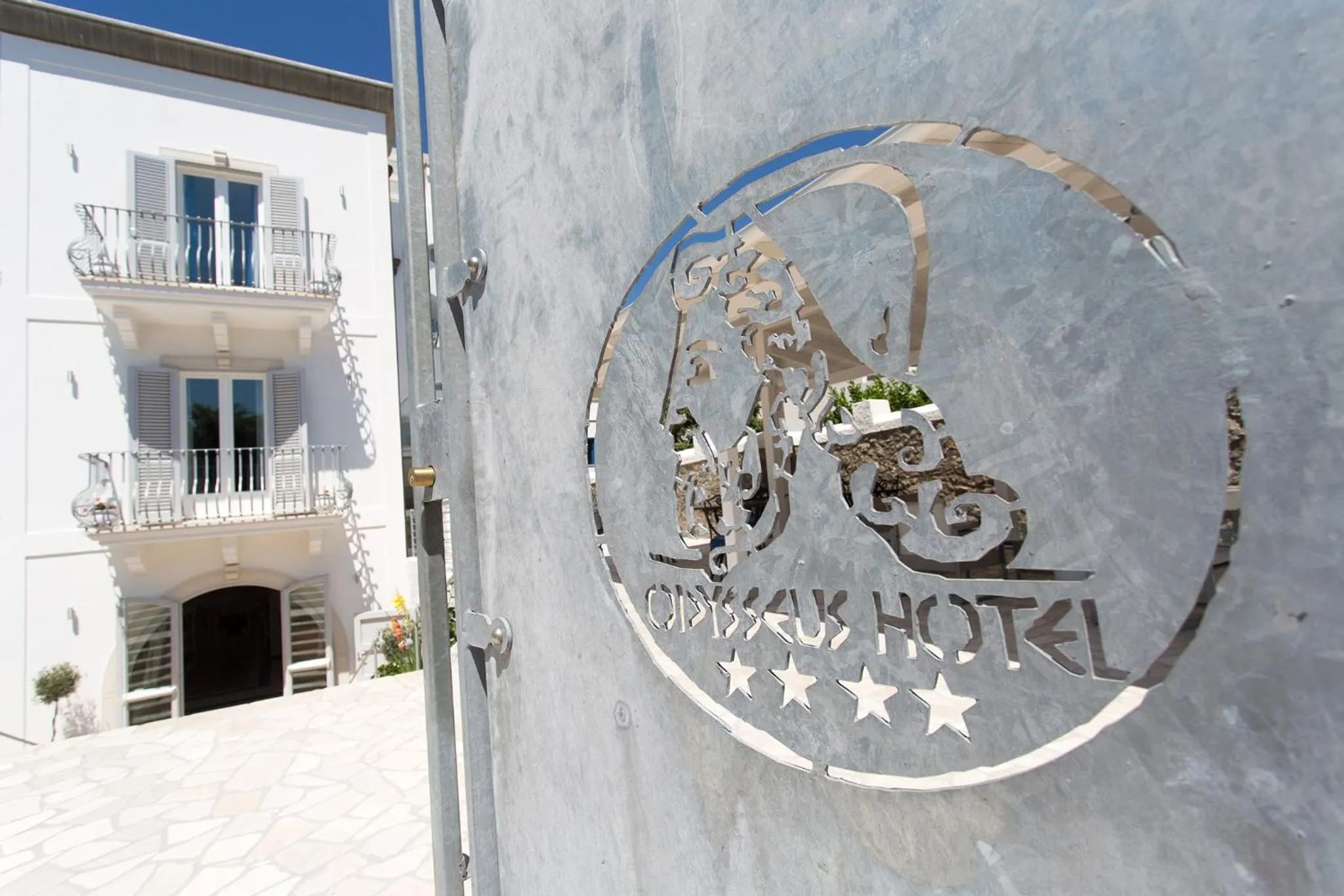 Property logo or sign in Odysseus Hotel