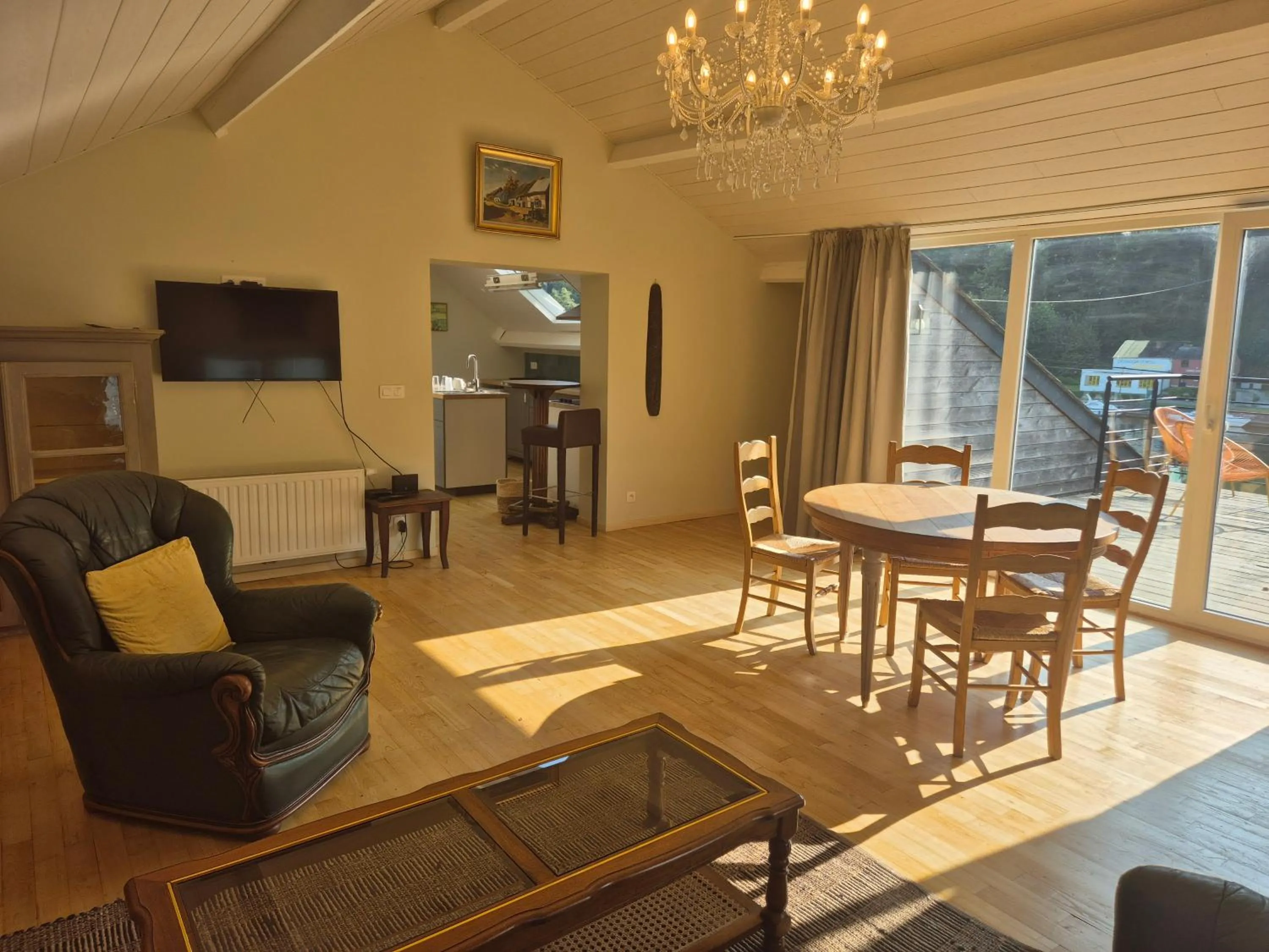 Communal lounge/ TV room in Auberge RIO