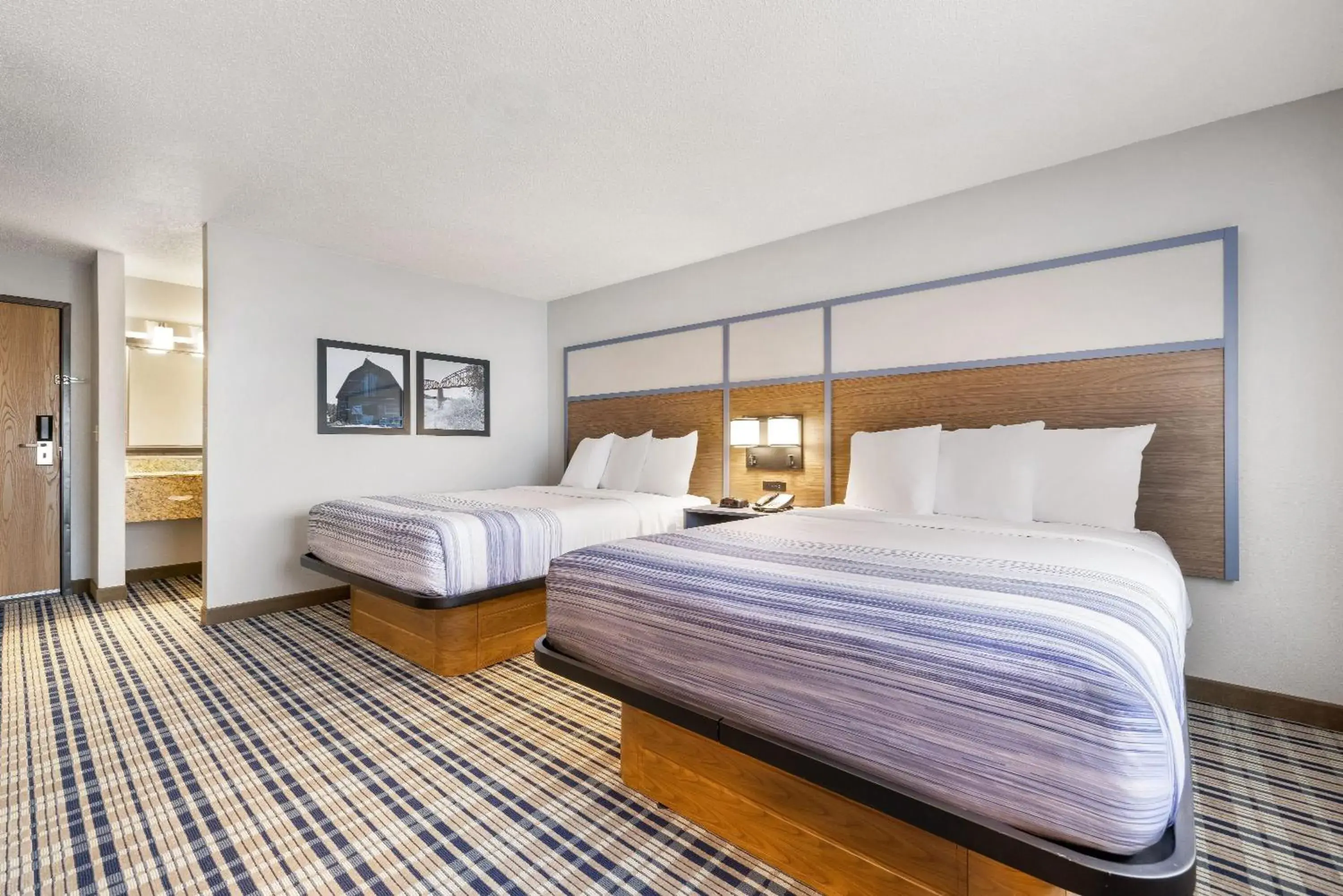 Bed in AmericInn by Wyndham Bismarck Bed in AmericInn by Wyndham Bismarck