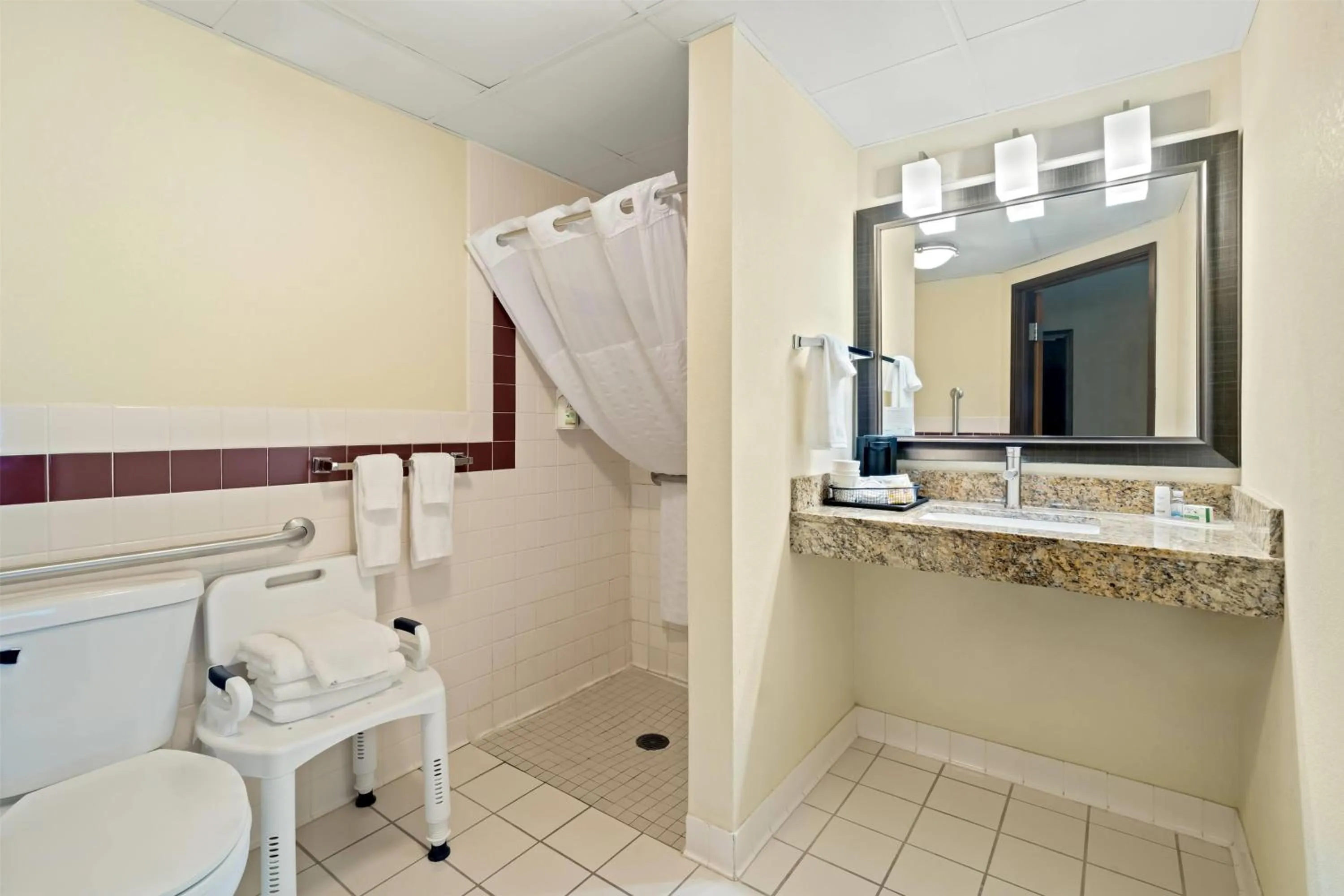 Bathroom in AmericInn by Wyndham Bismarck