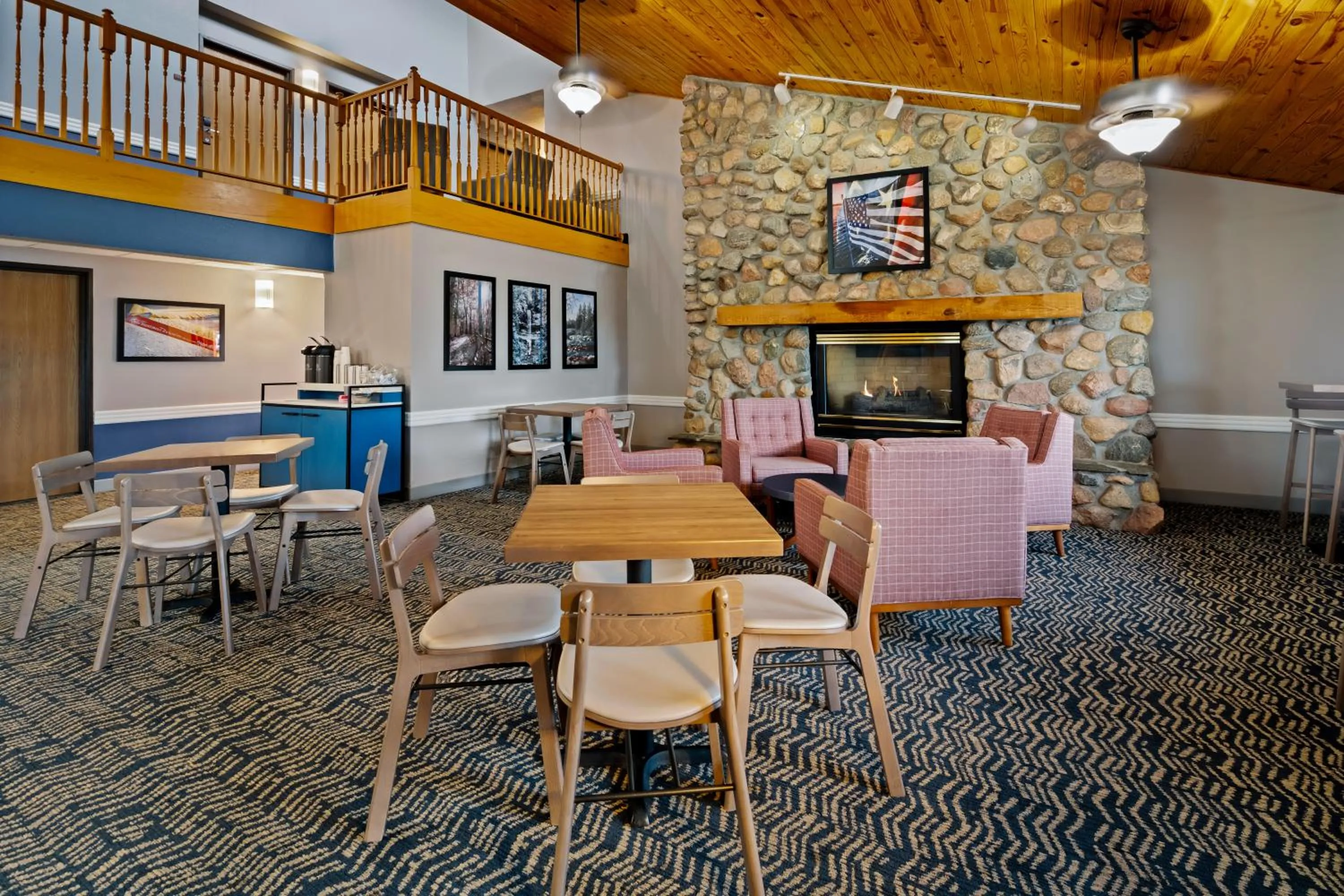 Seating area in AmericInn by Wyndham Bismarck