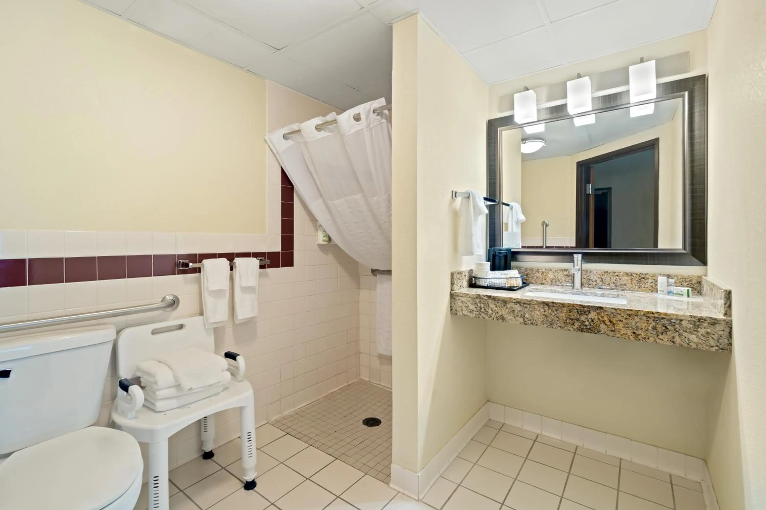 Bathroom in AmericInn by Wyndham Bismarck