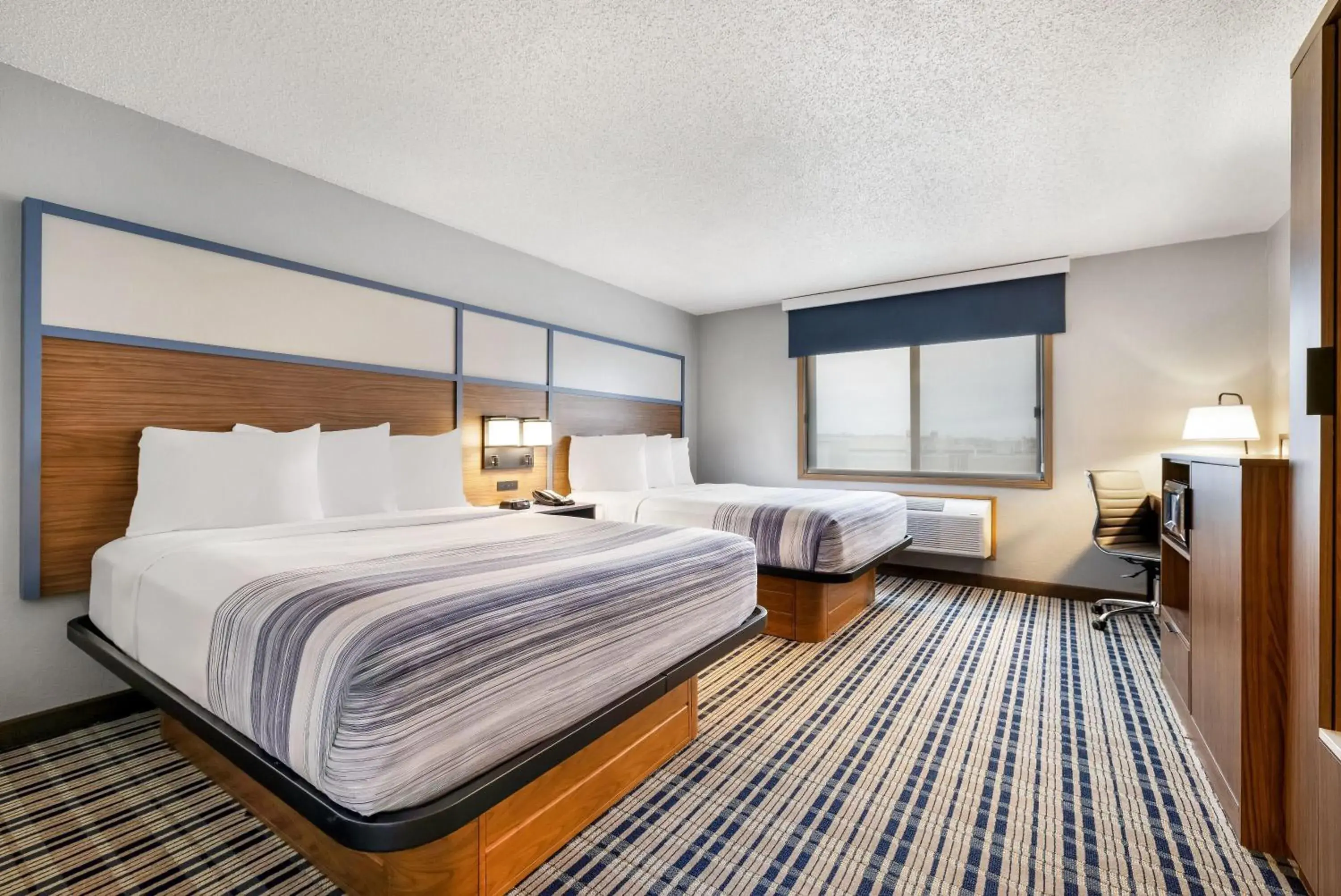 Bed in AmericInn by Wyndham Bismarck Bed in AmericInn by Wyndham Bismarck