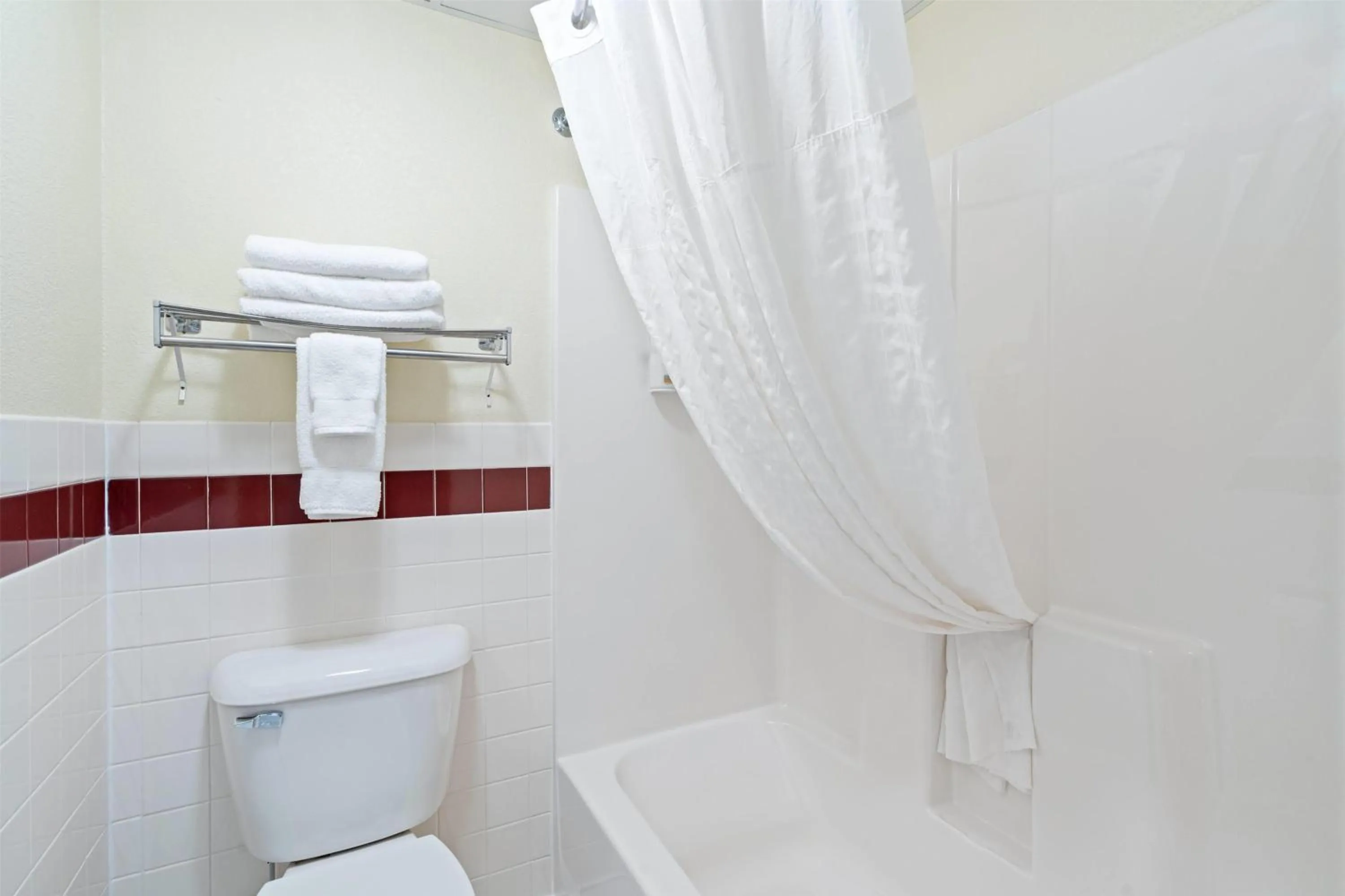 Bathroom in AmericInn by Wyndham Bismarck