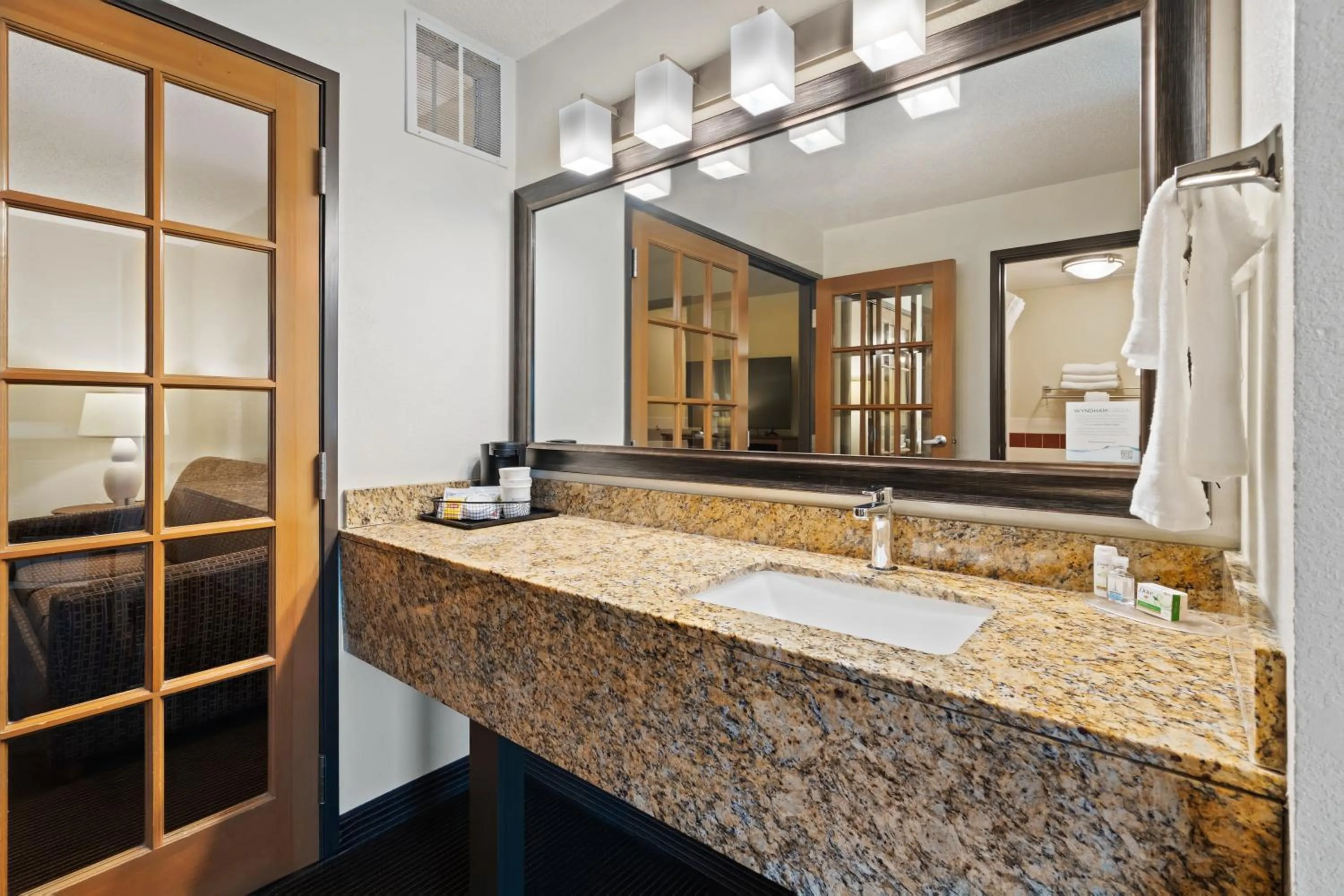 Bathroom in AmericInn by Wyndham Bismarck