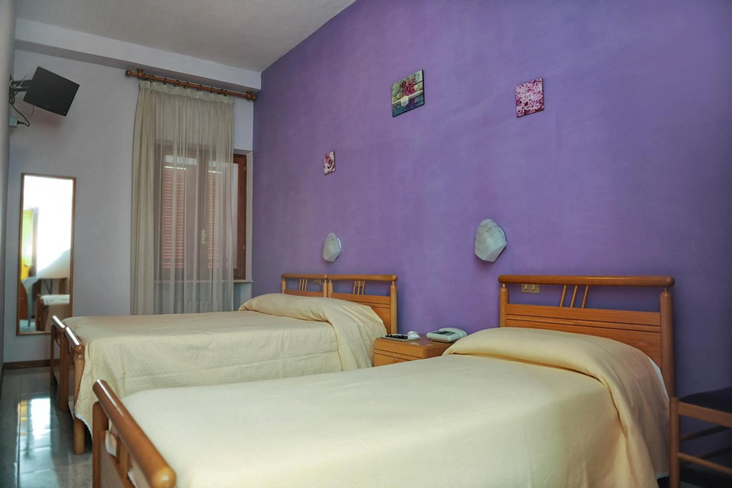 Photo of the whole room, Bed in Hotel Centrale di Paolo e Cinzia