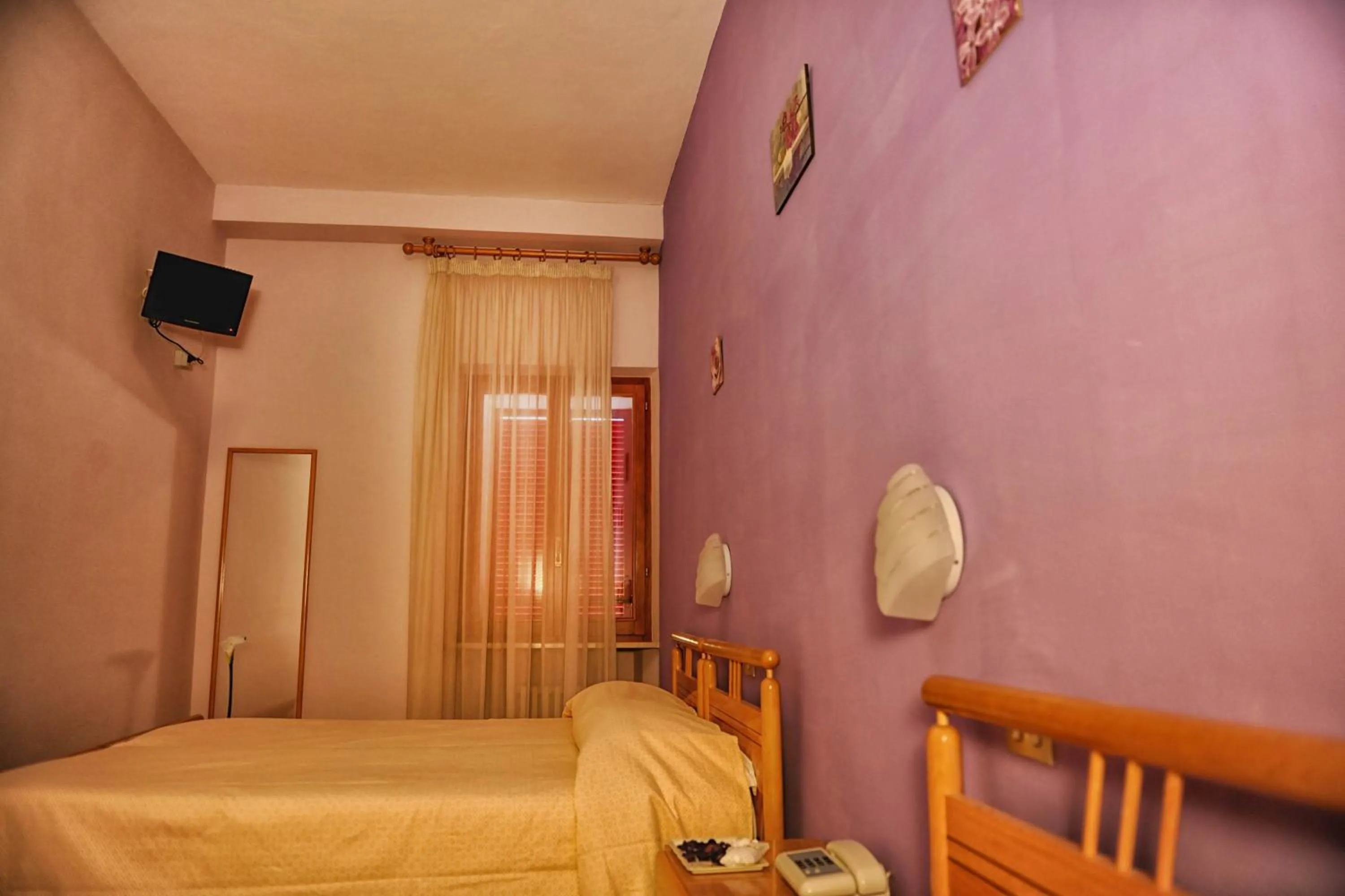 Photo of the whole room, Bed in Hotel Centrale di Paolo e Cinzia