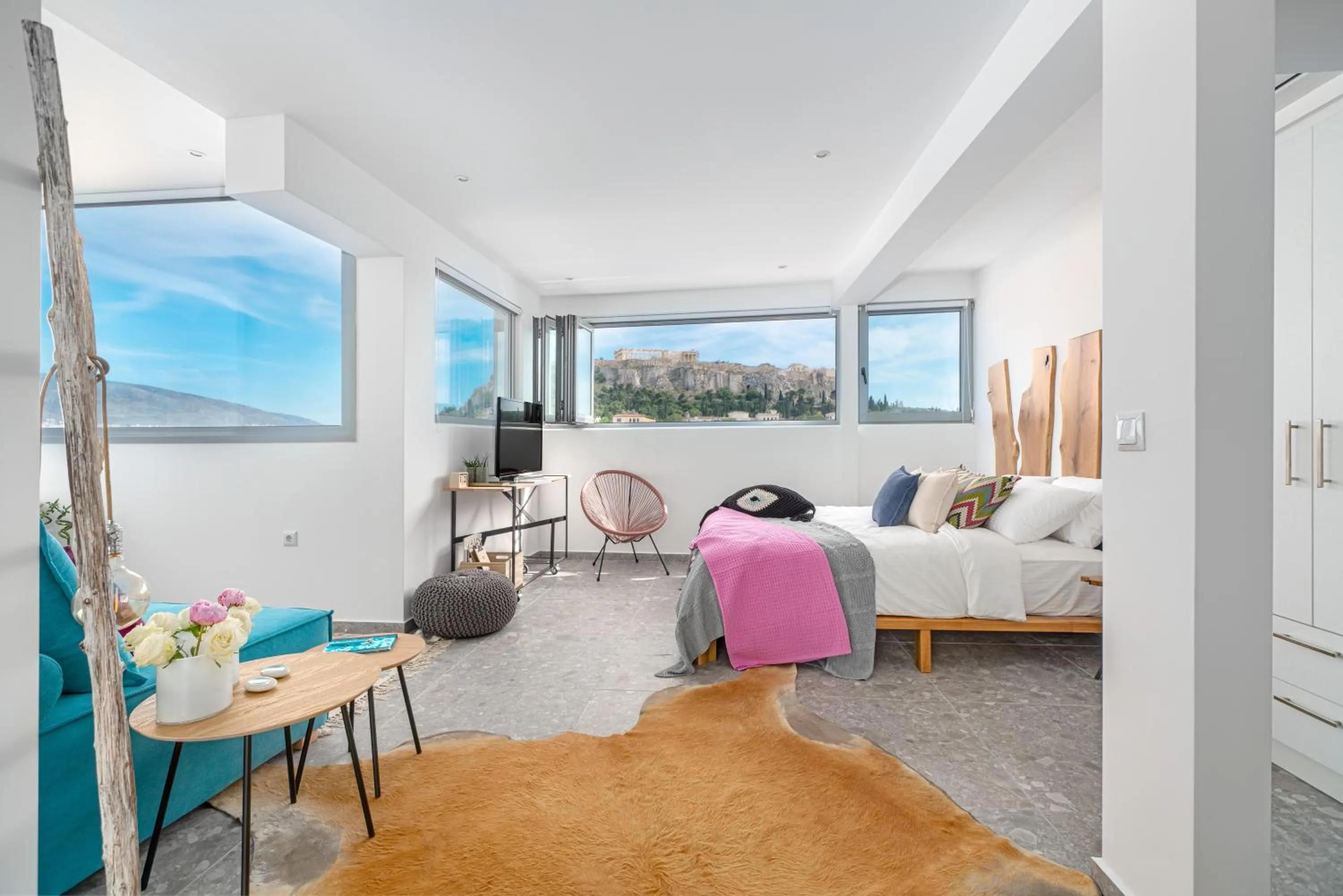 Bed in Mythos Luxury Suites