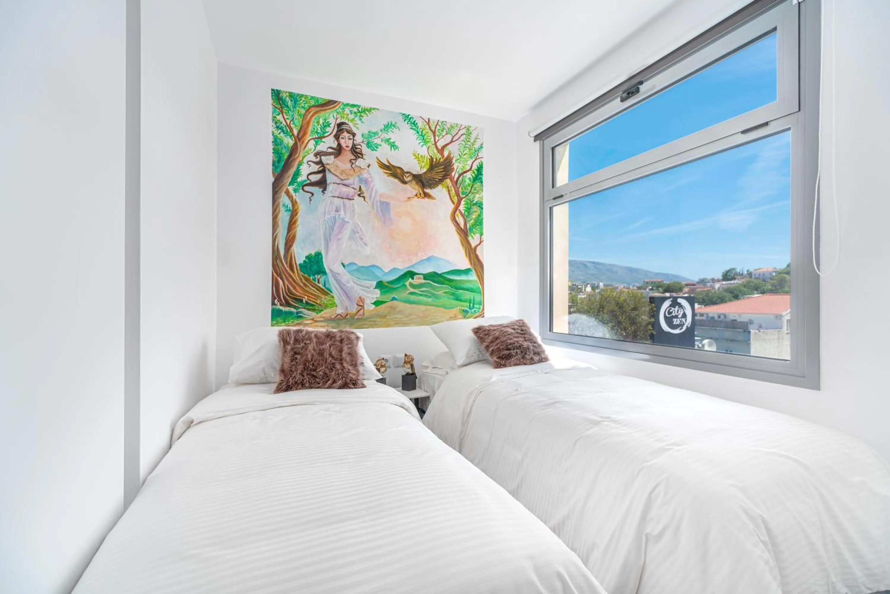 Bed in Mythos Luxury Suites