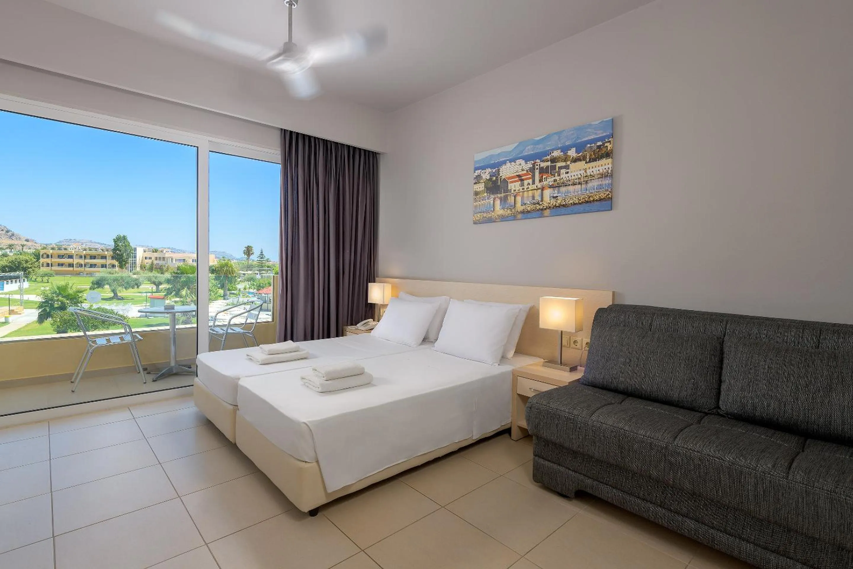 Photo of the whole room, Bed in Olive Garden Hotel